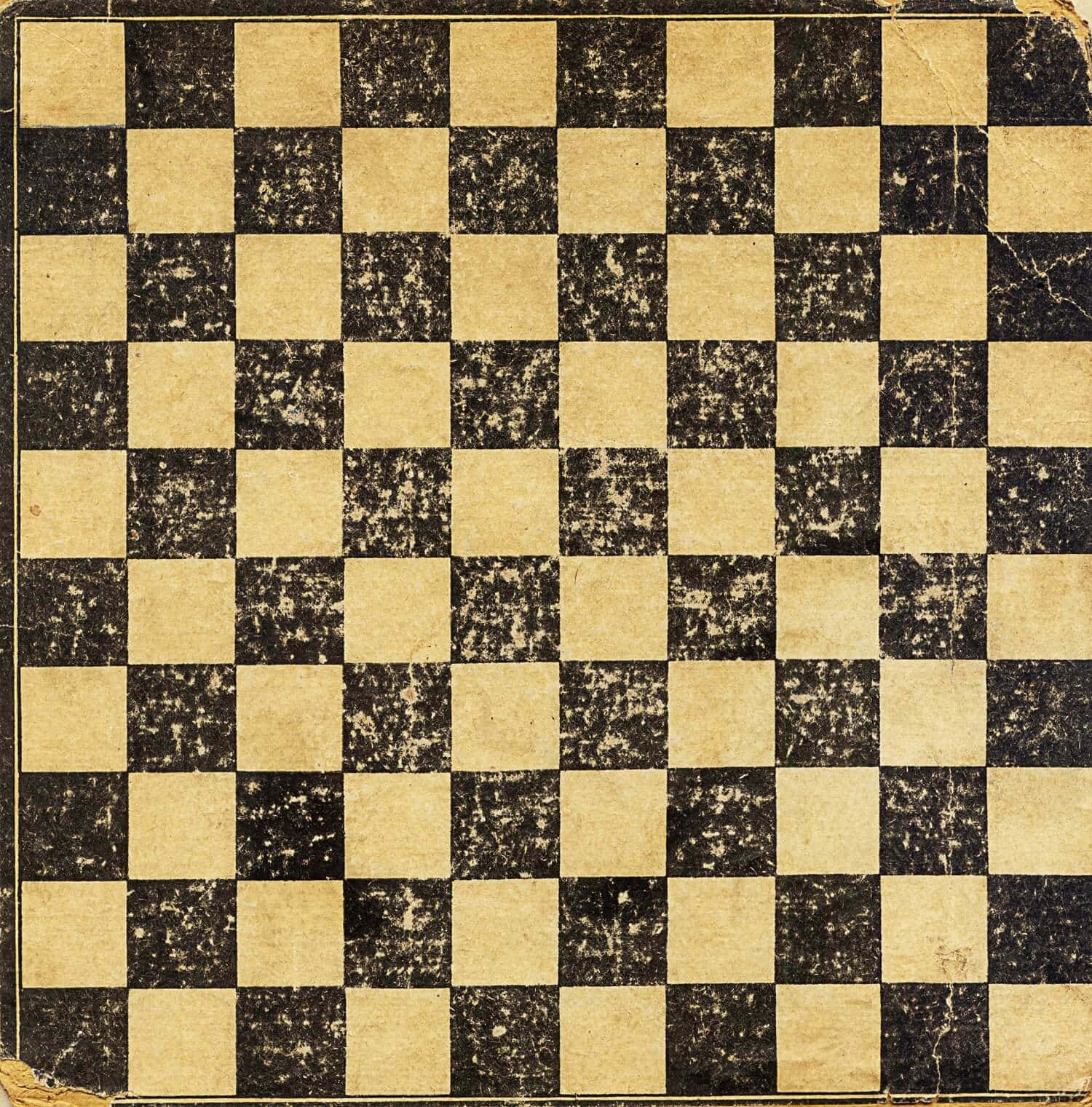 Chessboard 桌布 壁紙 — 一個風化的復古棋盤，米色和黑色的方格出現裂痕，顯示出歲月和使用痕跡。