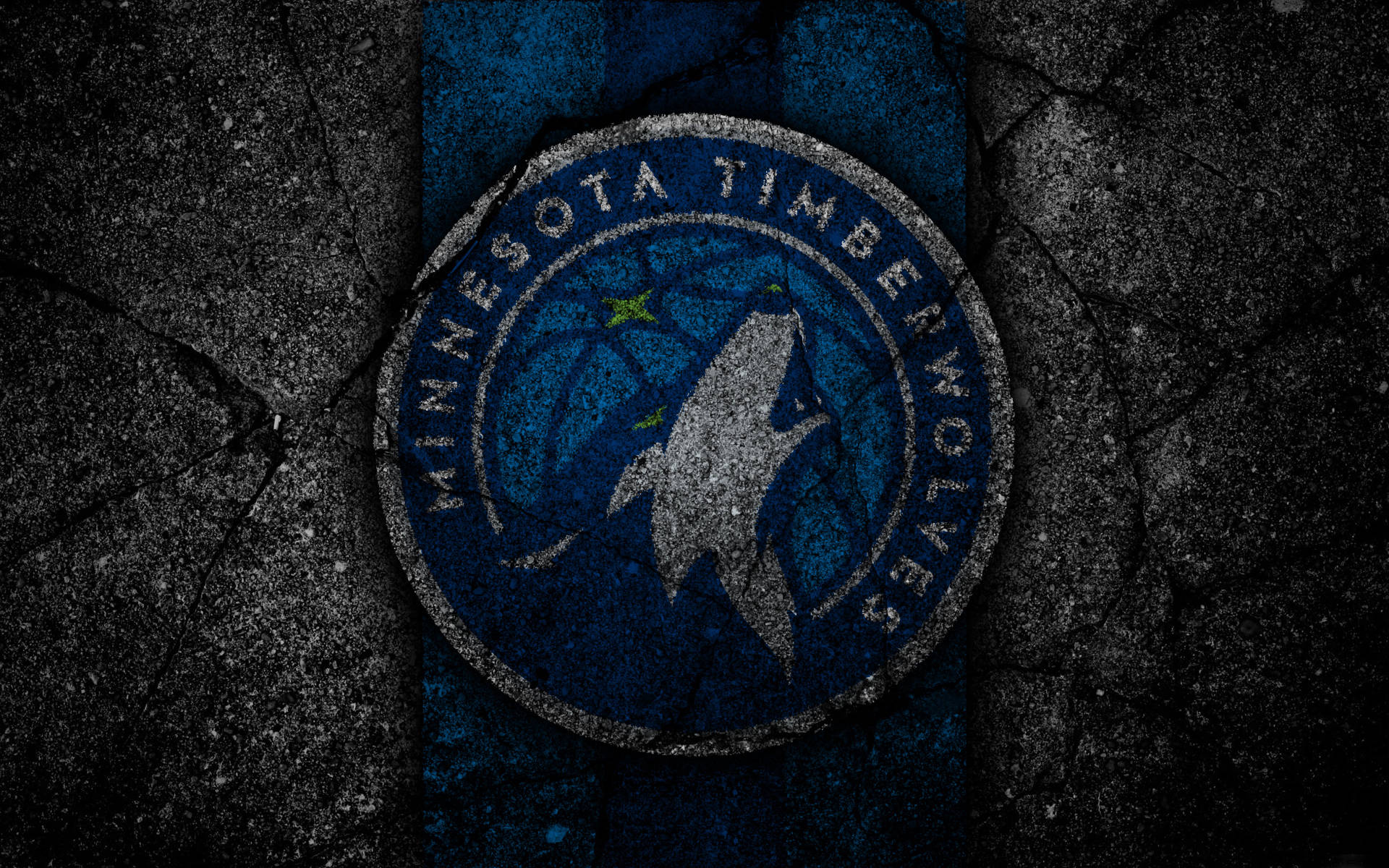 Timberwolves 桌布 壁紙 — 一個風化的明尼蘇達灰狼隊標誌嵌入在裂開的瀝青中，帶有粗糙的藍色和灰色紋理。