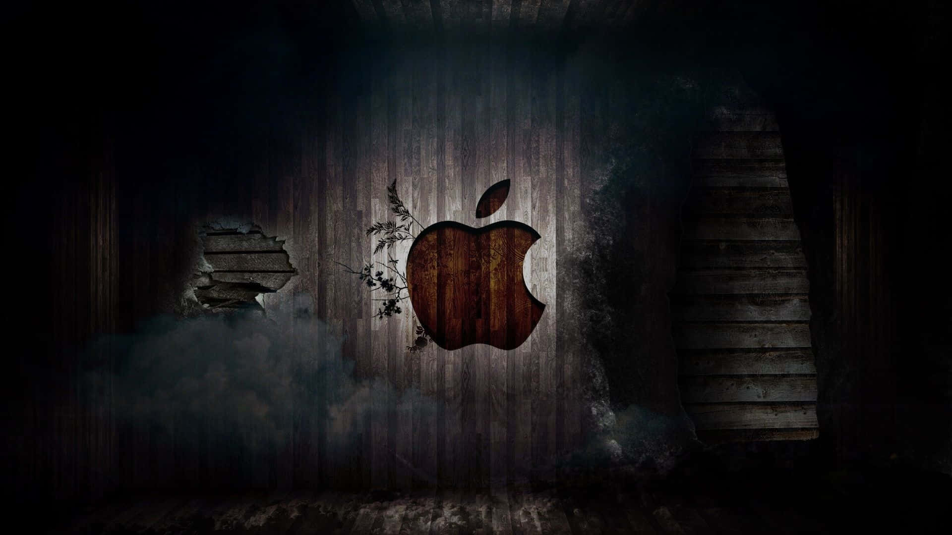 HD Apple 桌布 壁紙 — 一個風化的木製Apple標誌，藤蔓穿過破牆生長在一個黑暗、煙霧瀰漫、廢棄的房間裡。