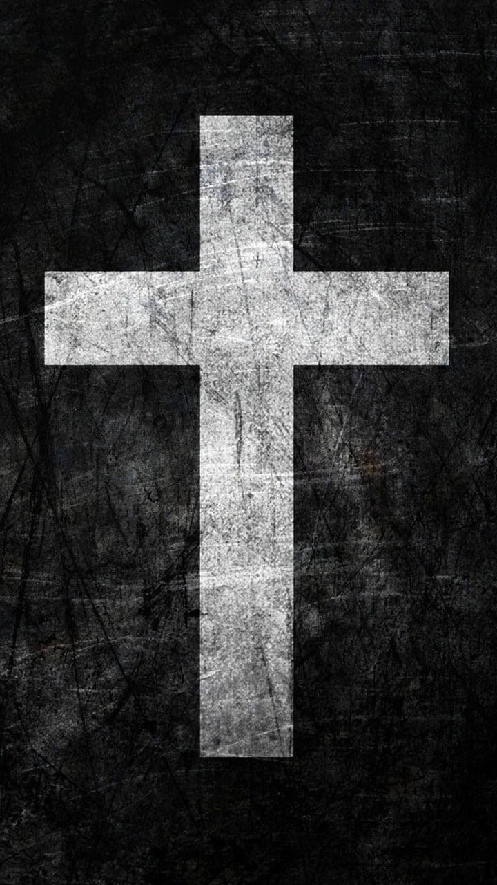 Christ 桌布 壁紙 — 一個風化的白色十字架在帶有刮痕和污垢的紋理黑色背景上顯得格外突出。