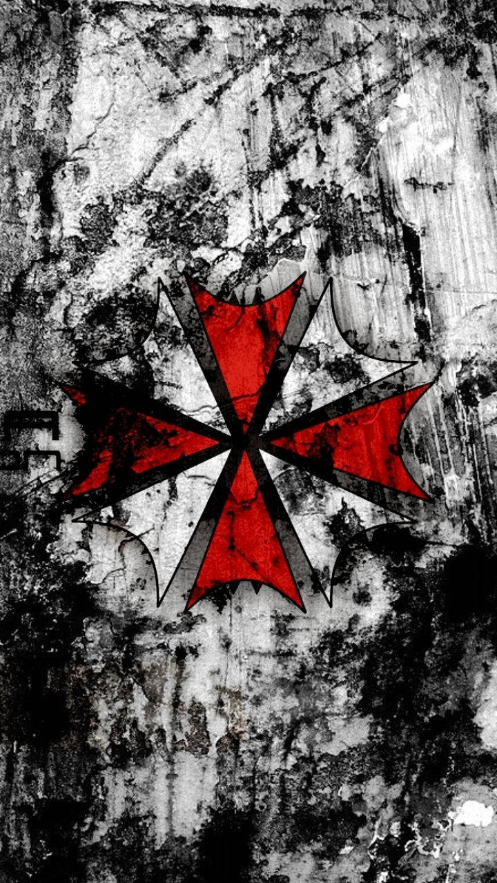 evil 桌布 壁紙 — 一個風化的紅黑馬爾他十字徽章在粗糙紋理的混凝土牆上格外突出。