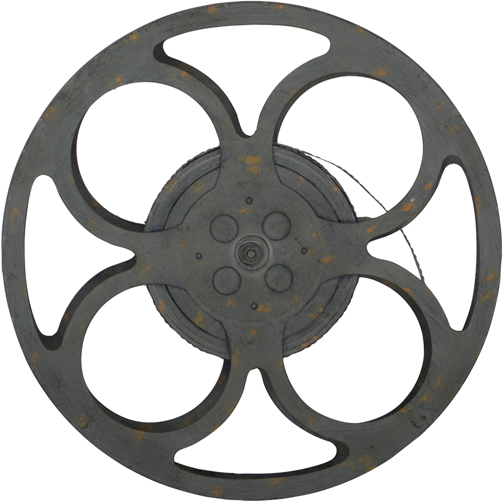 Film Reel 桌布 壁紙 — 一個風化的金屬膠卷，帶有鏽斑和一條捲曲的膠卷條，背景為黑色。