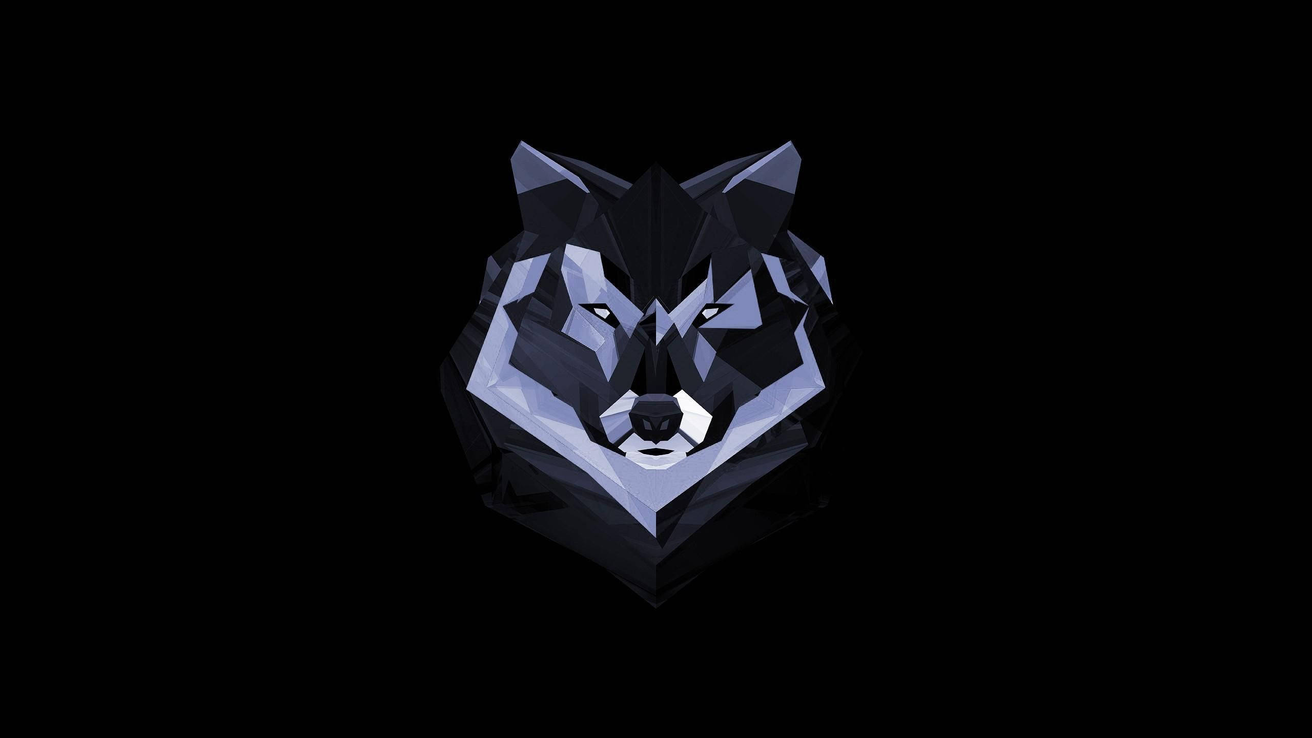 HD Wolf 桌布 壁紙 — 一個風格化的低多邊形狼頭，帶有銳利的幾何切面，在純黑色背景上發光。
