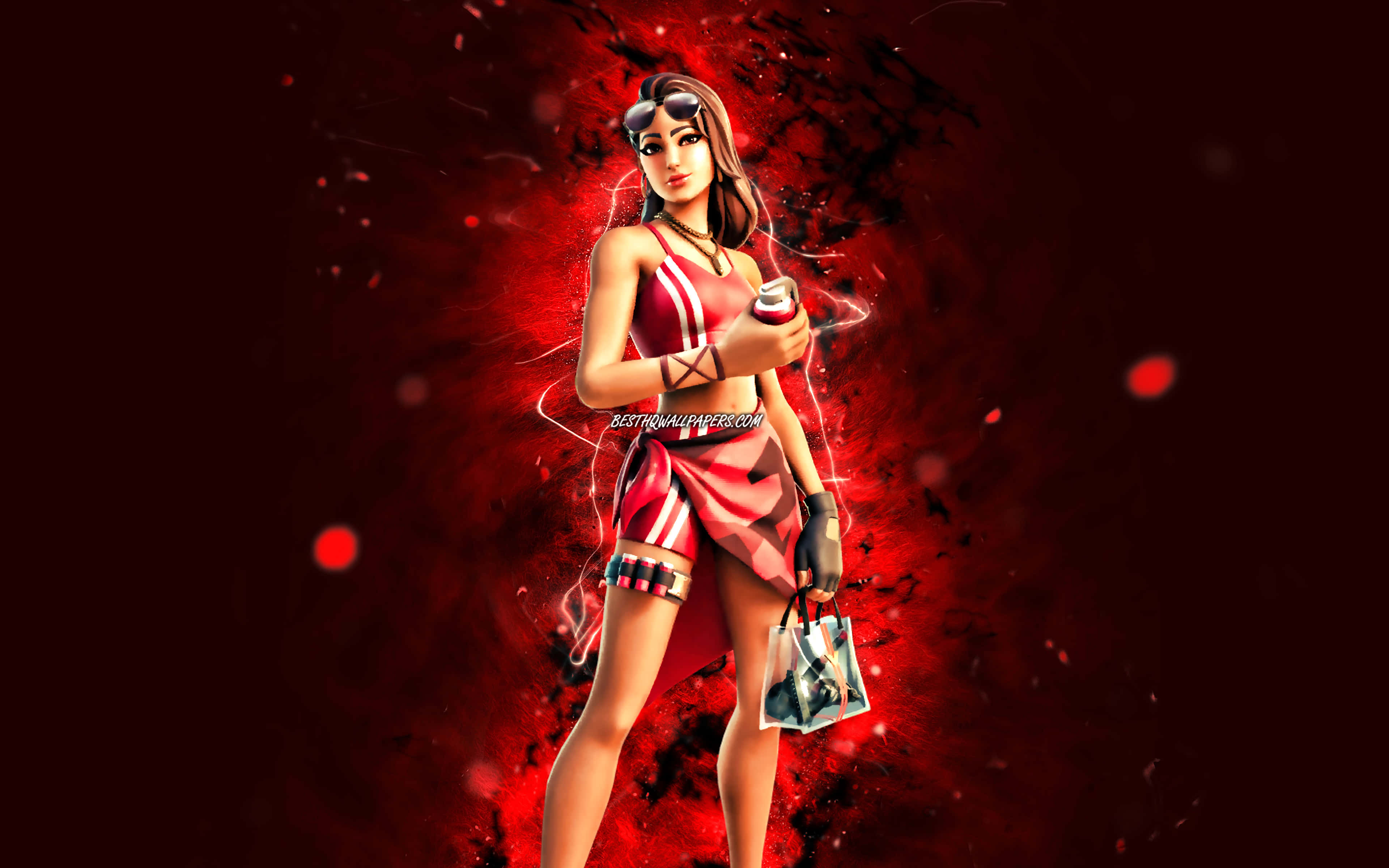 Ruby Fortnite Skin 桌布 壁紙 — 一個風格化的女性角色穿著紅色運動服，自信地站在動態的紅色能量爆發背景前。