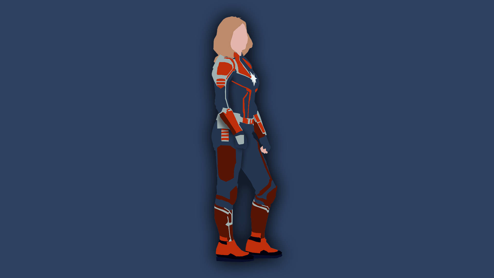 Captain Marvel 桌布 壁紙 — 一個風格化的女性超級英雄，身穿紅色和藍色盔甲，側面站立在純深藍色背景前。