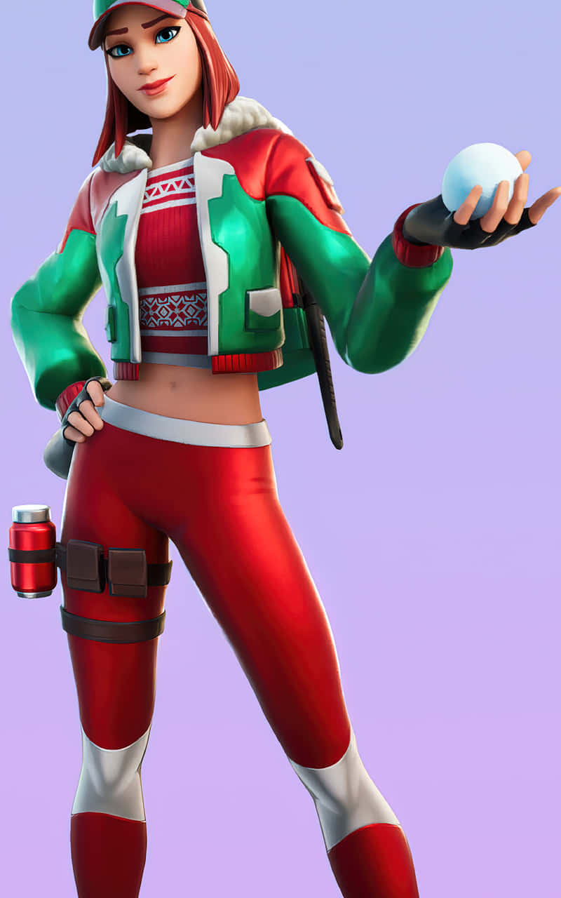 Ruby Fortnite Skin 桌布 壁紙 — 一個風格化的女性遊戲玩家，穿著紅綠色冬季裝備，在柔和的紫色背景前拿著雪球。