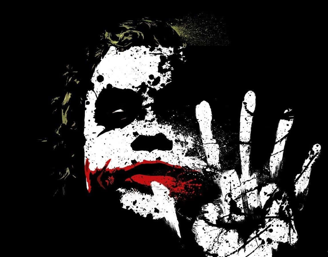 Joker Painting 桌布 壁紙 — 一個風格化的小丑圖形，臉上塗抹著白色、紅唇，一隻手壓向觀眾，背景為黑色。