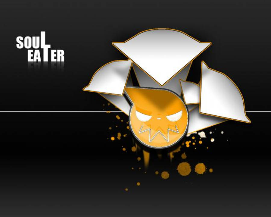soul eater moon 桌布 壁紙 — 一個風格化的橙色頭骨，帶有鋒利的牙齒和白色的眼睛，從一個破碎的銀色盒子中爆出，背景為黑色，帶有金色飛濺。