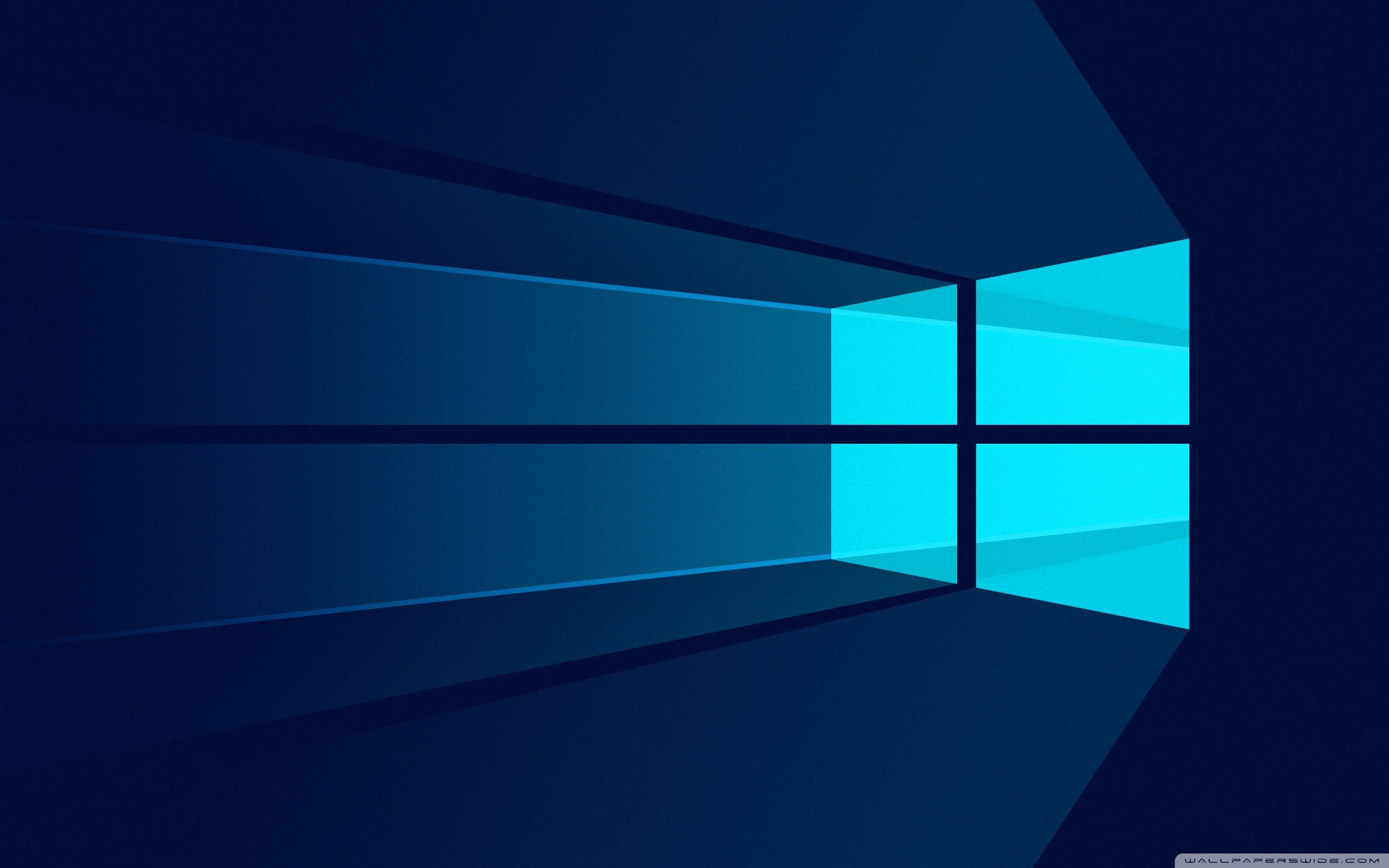Windows 桌布 壁紙 — 一個風格化的窗戶標誌，在深藍色漸變背景上發出青色光芒。