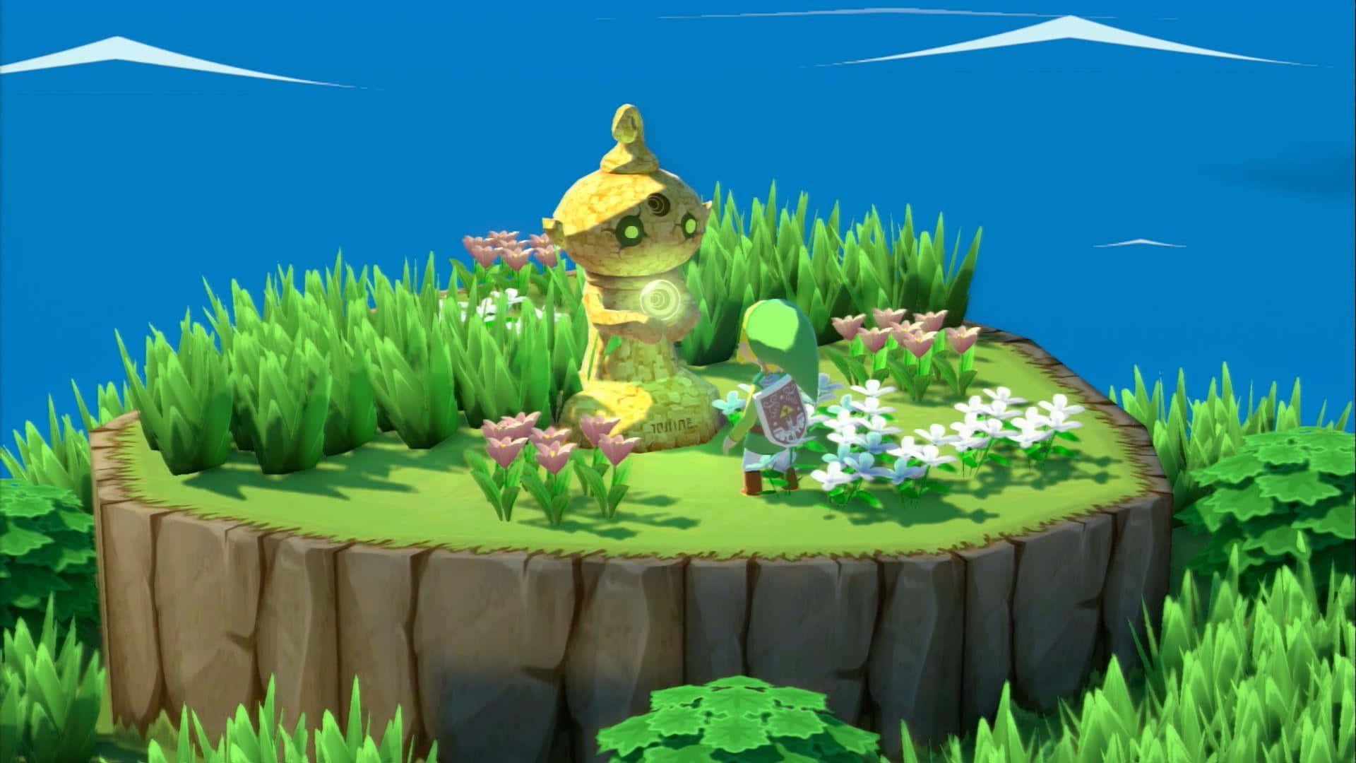 The Legend Of Zelda The Wind Waker 桌布 壁紙 — 一個風格化的綠色角色站在一個金色雕像旁邊，位於一個被粉紅色和白色花朵環繞的草地懸崖上，天空清澈湛藍。