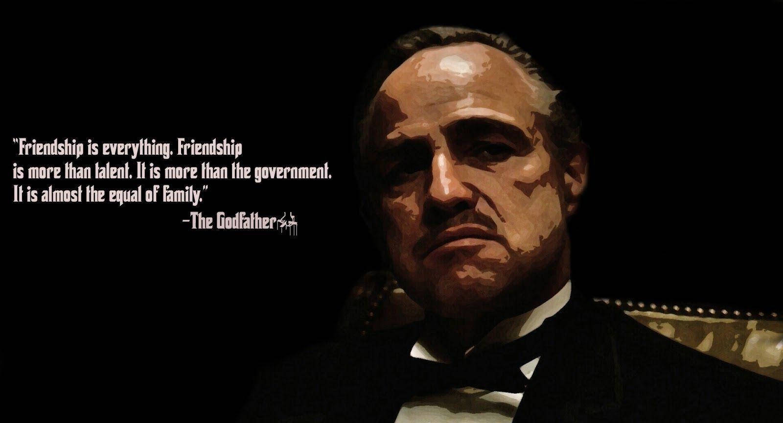 Godfather 桌布 壁紙 — 一個風格化的肖像，一個穿著燕尾服的嚴肅男子，背景為黑色，並附有《教父》的引文。