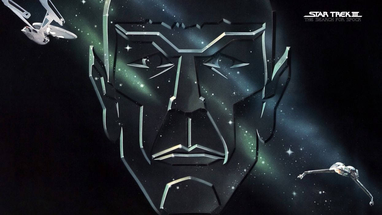 史巴克 桌布 壁紙 — 一個風格化的金屬面孔從星域中浮現，星際飛船在深空中飛過。