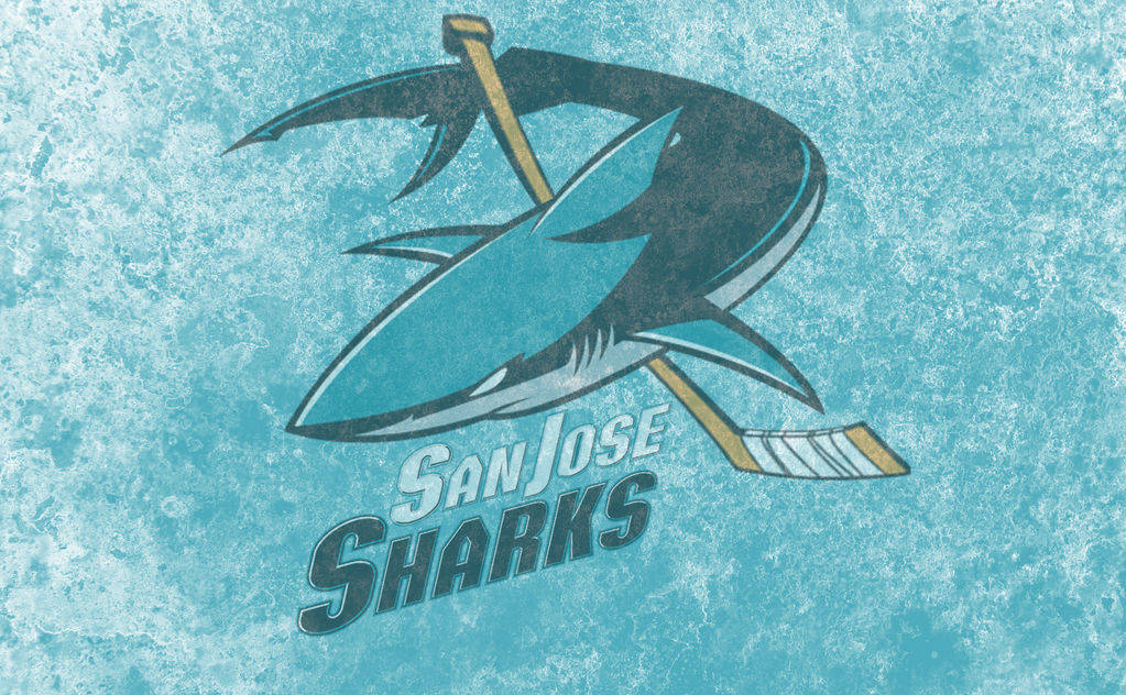 sharks 桌布 壁紙 — 一個風格化的鯊魚在帶有紋理的冰藍色背景上拿著曲棍球棒，並帶有「San Jose Sharks」文字。