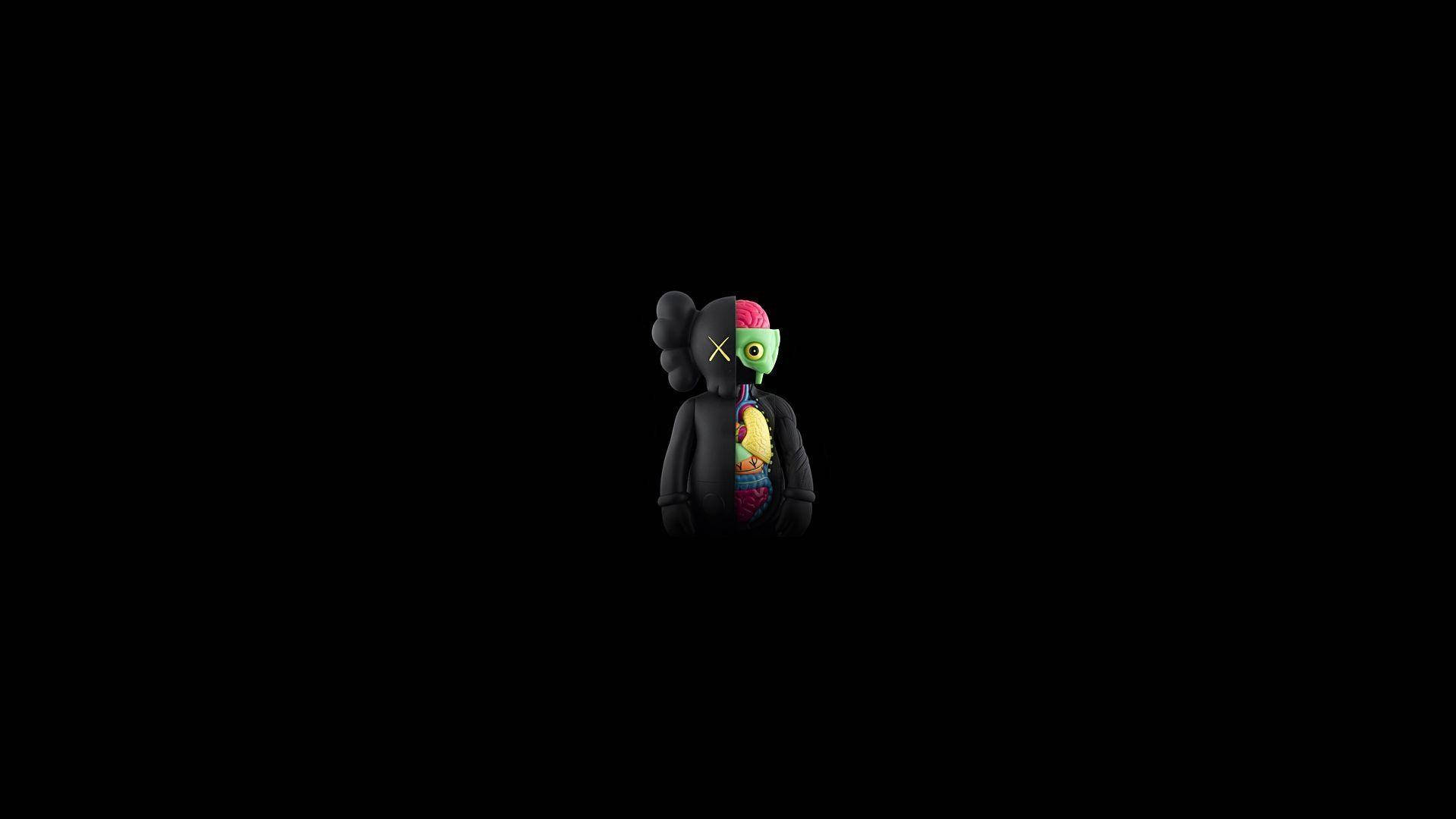 kaws 4K 桌布 壁紙 — 一個風格化的黑色KAWS人偶，暴露了色彩繽紛的內部器官，綠色面孔，居中站立在純黑色背景上。