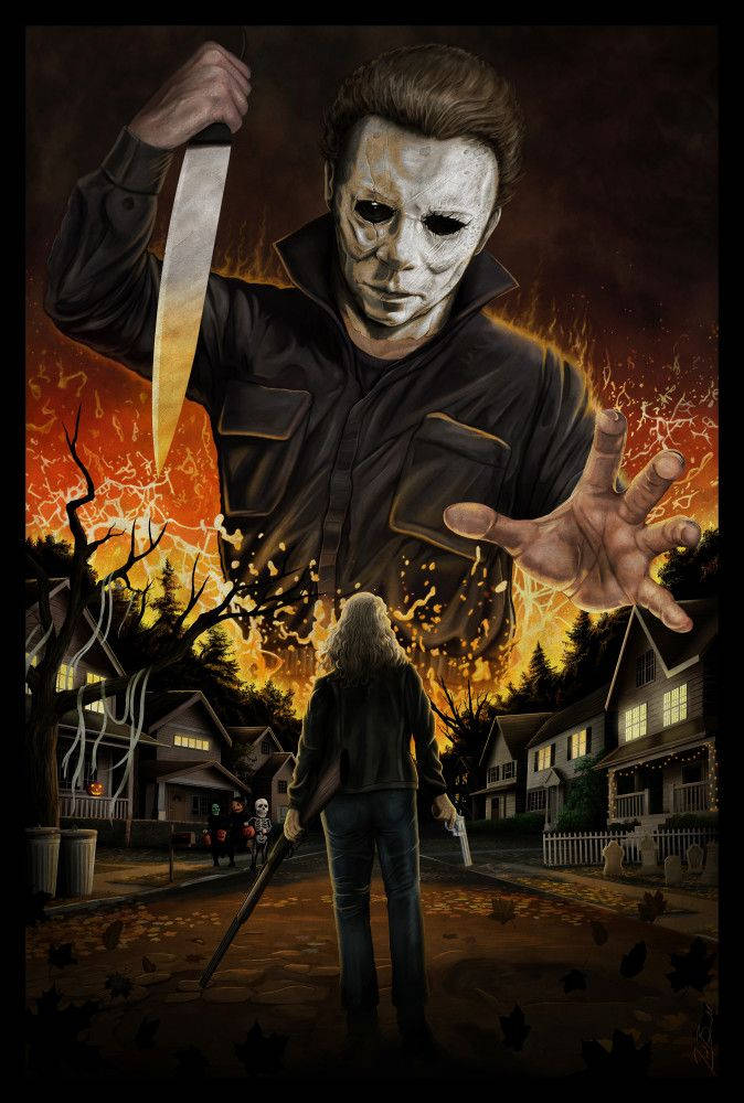 Halloween Kills 桌布 壁紙 — 一個高大的蒙面殺手在夜晚的郊區街道上籠罩著一個驚恐的身影，火焰在他身後爆發。