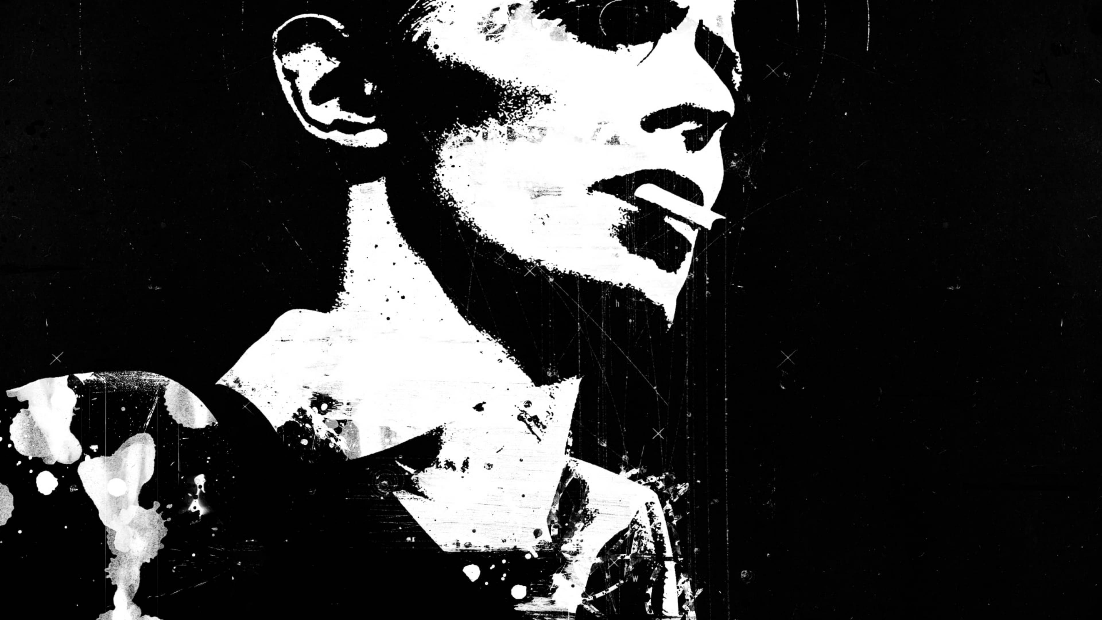 David Bowie 桌布 壁紙 — 一個高對比度的黑白風格化肖像，描繪一個吸煙的人，帶有粗糙紋理和飛濺效果。