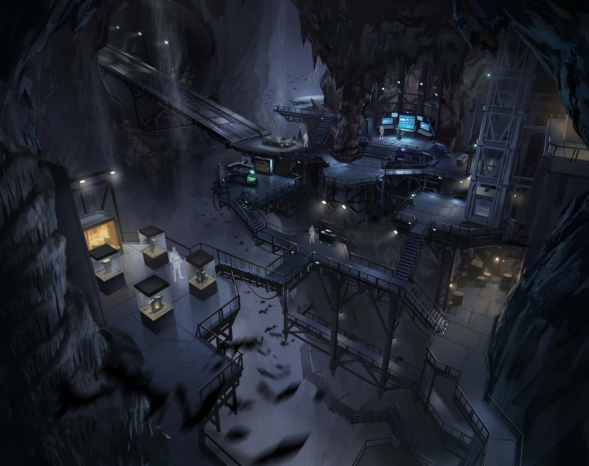 Batcave 桌布 壁紙 — 一個高科技研究站，位於一個由人造燈光和發光螢幕照亮的洞穴深處。