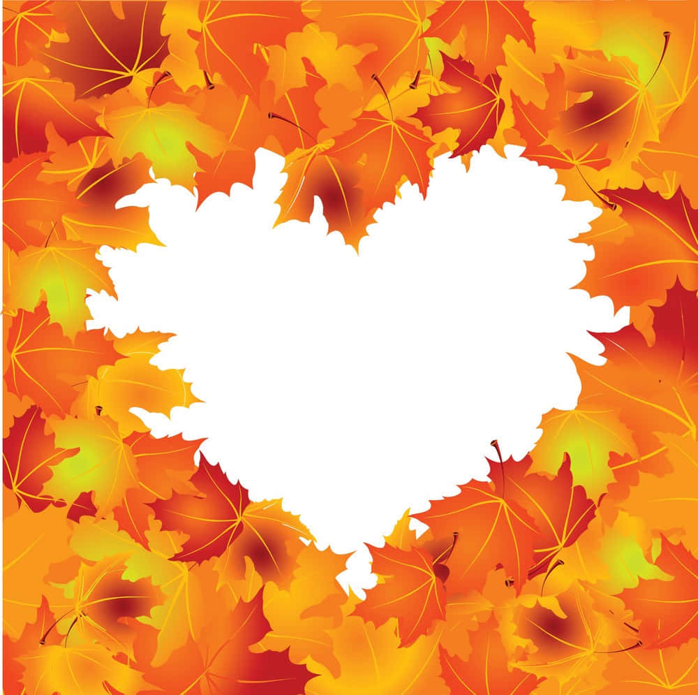 Fall Leaf 桌布 壁紙 — 一個鮮明的心形鏤空圖案，由重疊的秋天楓葉以火熱的橙、黃、紅色調框住。