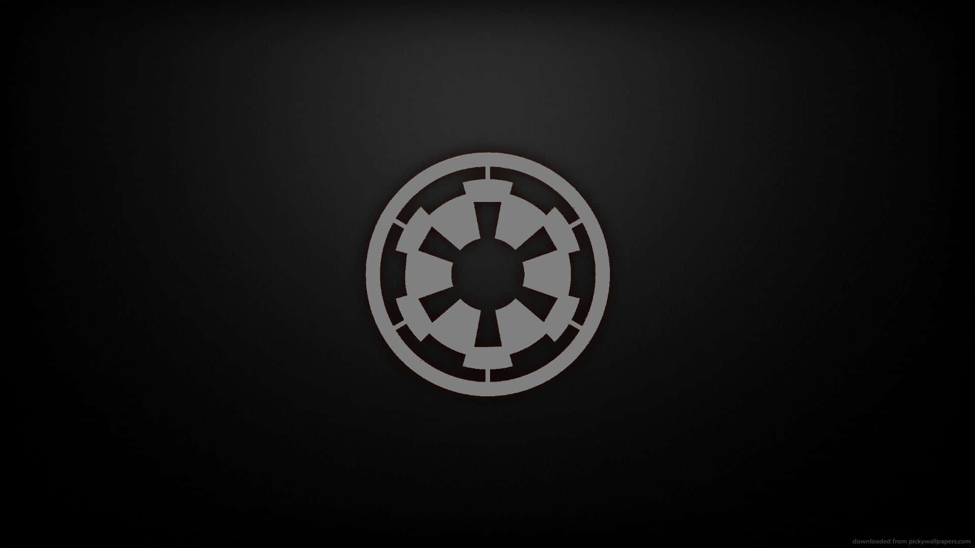 Galactic Empire 桌布 壁紙 — 一個鮮明的灰色帝國徽章居中於漸變黑色背景上，帶有微妙的燈光效果。