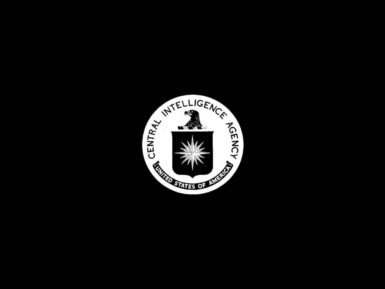 Cia 桌布 壁紙 — 一個鮮明的白色中央情報局印章居中在純黑色背景上。