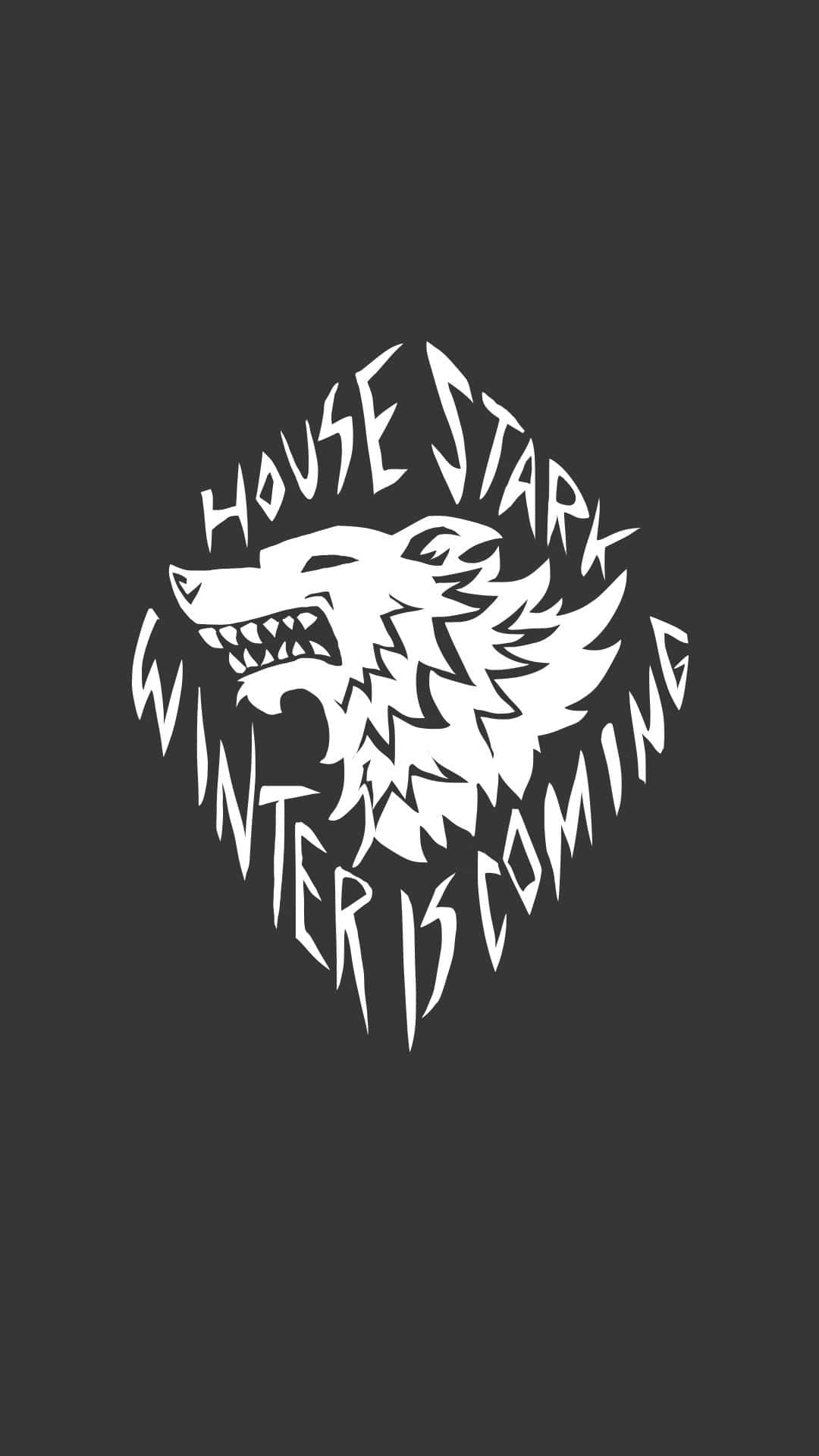 手機 桌布 壁紙 — 一個鮮明的白色冰原狼徽章，上面有「House Stark」和「Winter is Coming」文字，背景為深灰色。