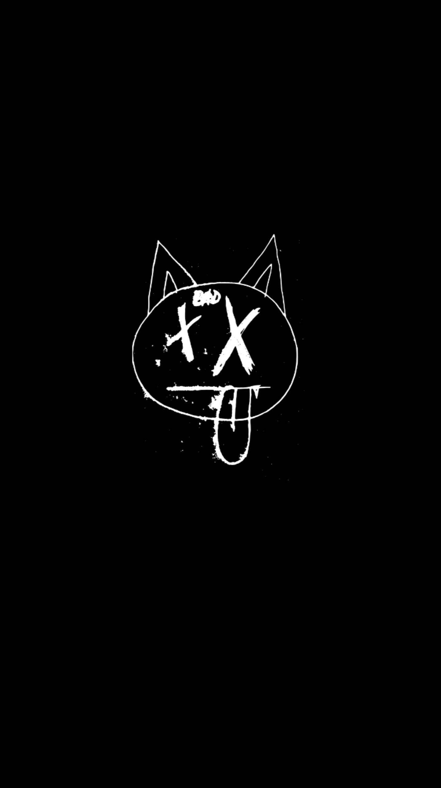 xxxtentacion 美學 桌布 壁紙 — 一個鮮明的白色塗鴉風格貓臉，帶有X形眼睛和伸出的舌頭，襯在純黑色背景上。