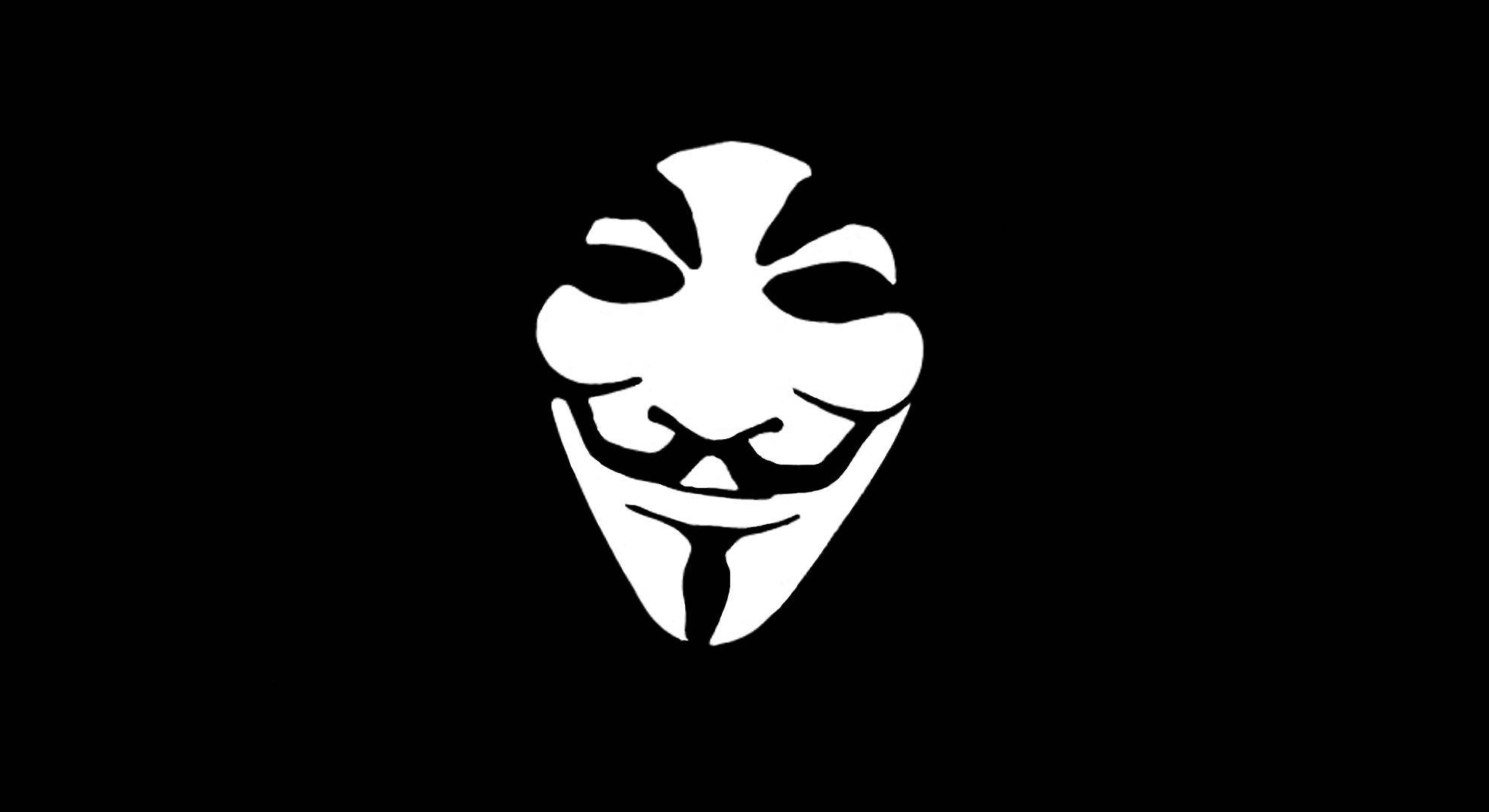 匿名 桌布 壁紙 — 一個鮮明的白色蓋伊·福克斯面具，居中在純黑色背景上，對比度高。