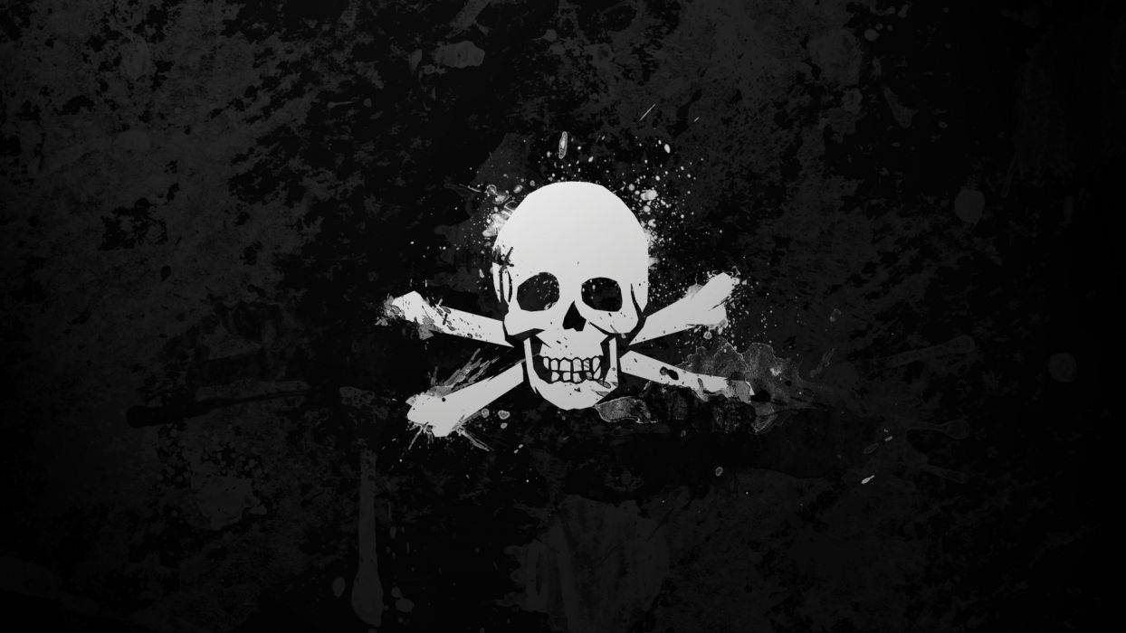 死亡 桌布 壁紙 — 一個鮮明的白色骷髏頭和交叉骨，上面濺滿油漆，背景是粗糙的黑色紋理。