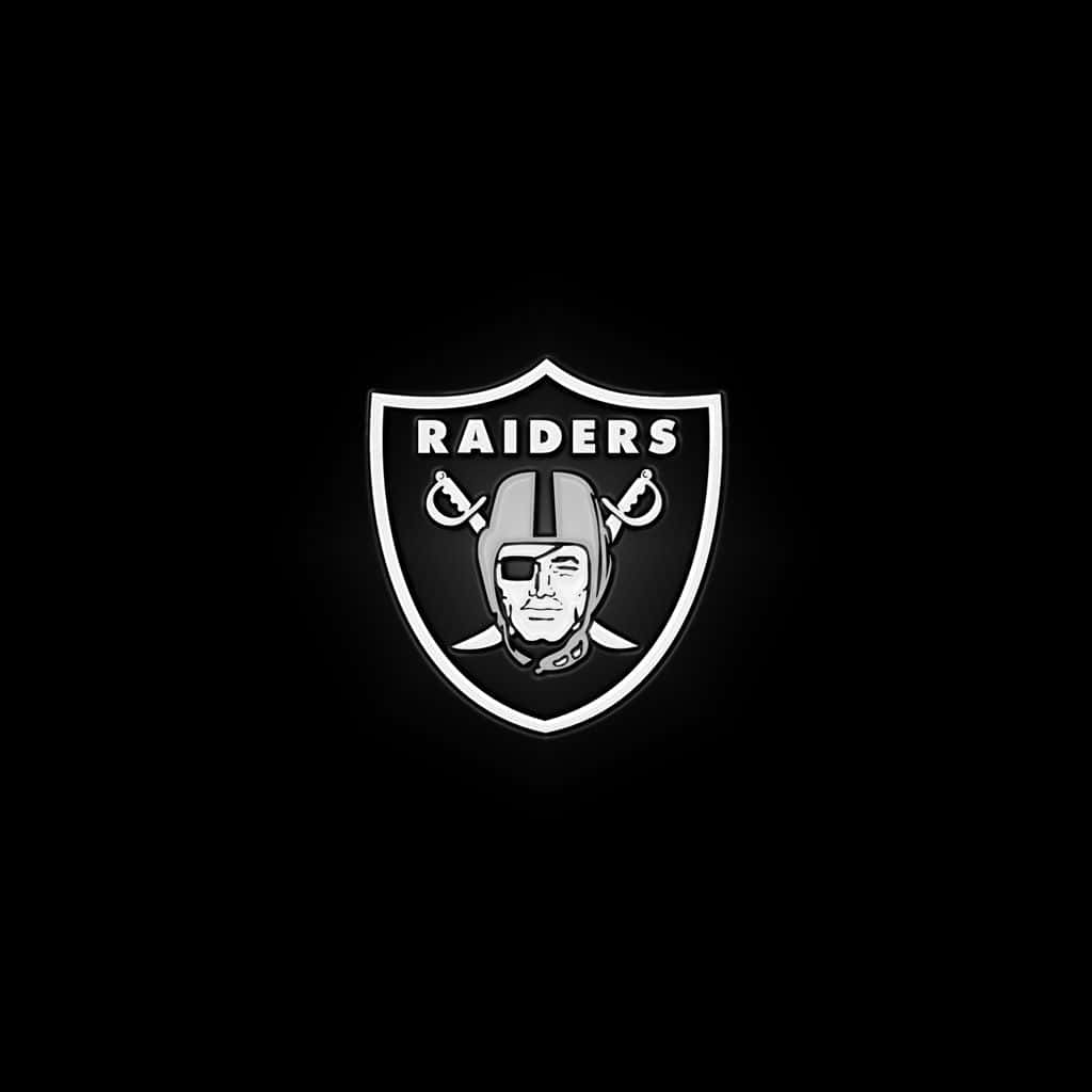 Raiders 足球隊標誌在黑色背景上帶有發光輪廓 — 突襲者 GIF 壁紙