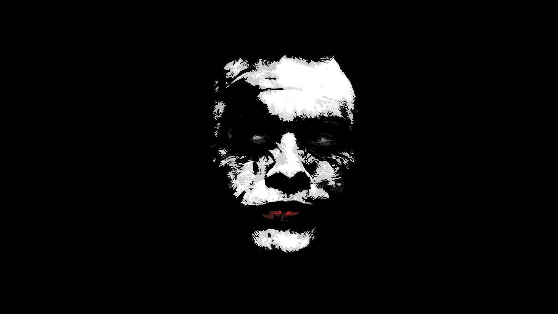 Black And White Joker 桌布 壁紙 — 一個鮮明的黑白數位藝術肖像，描繪一張帶有發光紅唇的威脅面孔，背景是虛空。