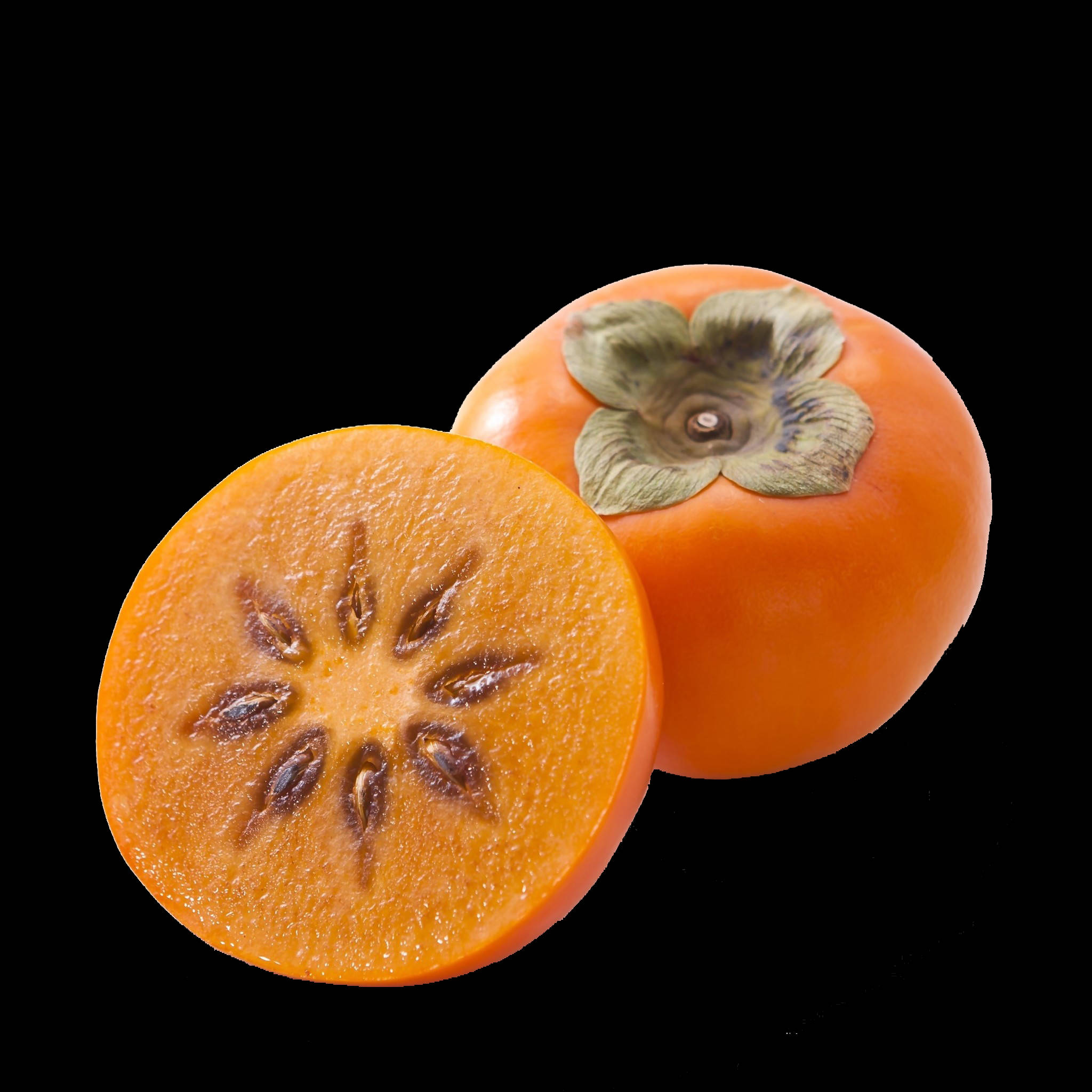 Fruit 桌布 壁紙 — 一個鮮橙色的柿子切半，露出多汁的果肉和種子，襯托在純黑背景上。