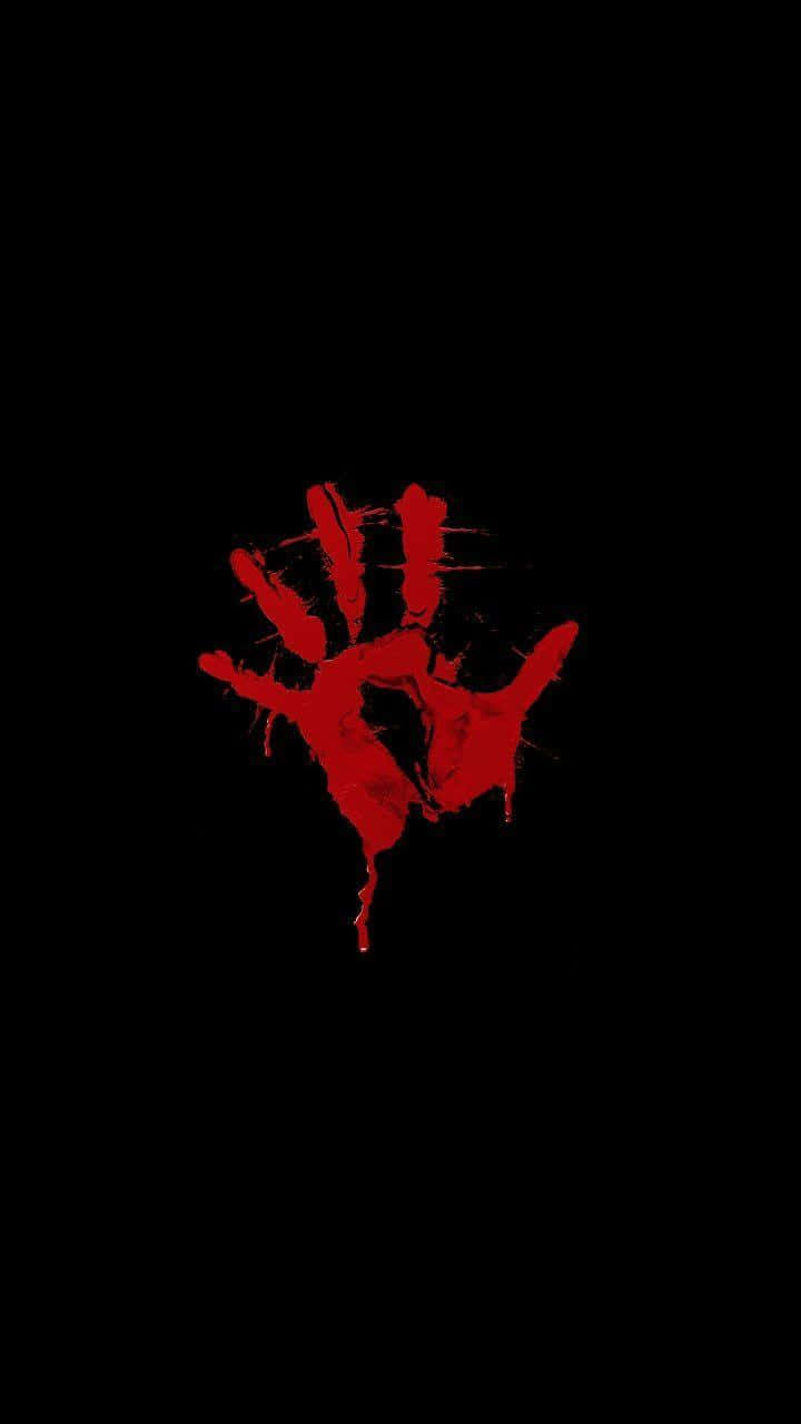 Hand Print 桌布 壁紙 — 一個鮮紅的血手印抹在純黑背景上，營造出令人毛骨悚然的恐怖效果。