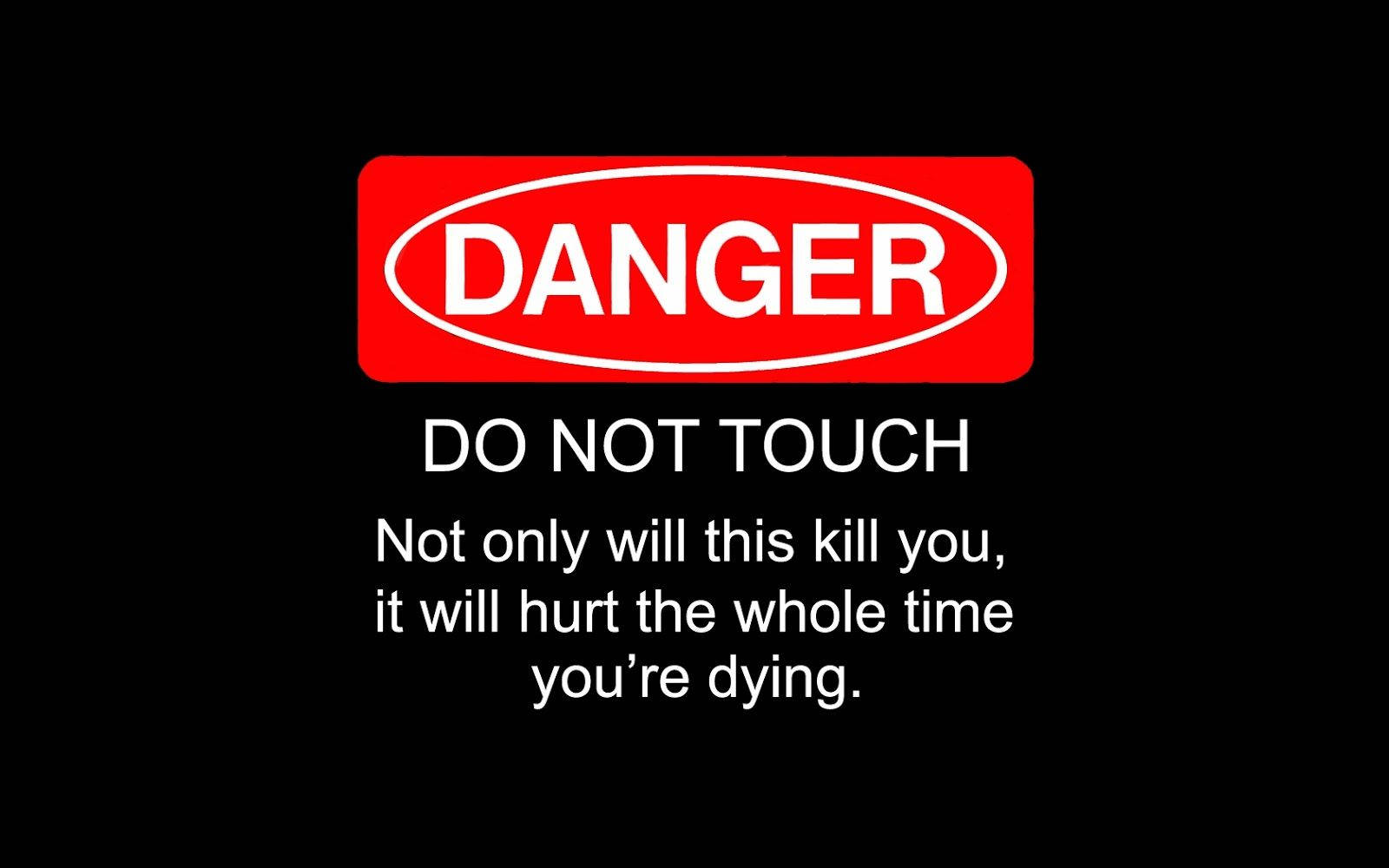 Dont Touch My Computer 桌布 壁紙 — 一個鮮紅色的危險標誌警告「請勿觸摸」，下方帶有冷幽默的威脅文字，背景為黑色。