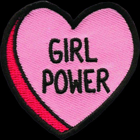 Heart Tattoo 桌布 壁紙 — 一個鮮豔的粉紅色心形補丁，帶有粗體黑色「GIRL POWER」文字和紅色條紋，在深色背景上縫有可見的紋理。