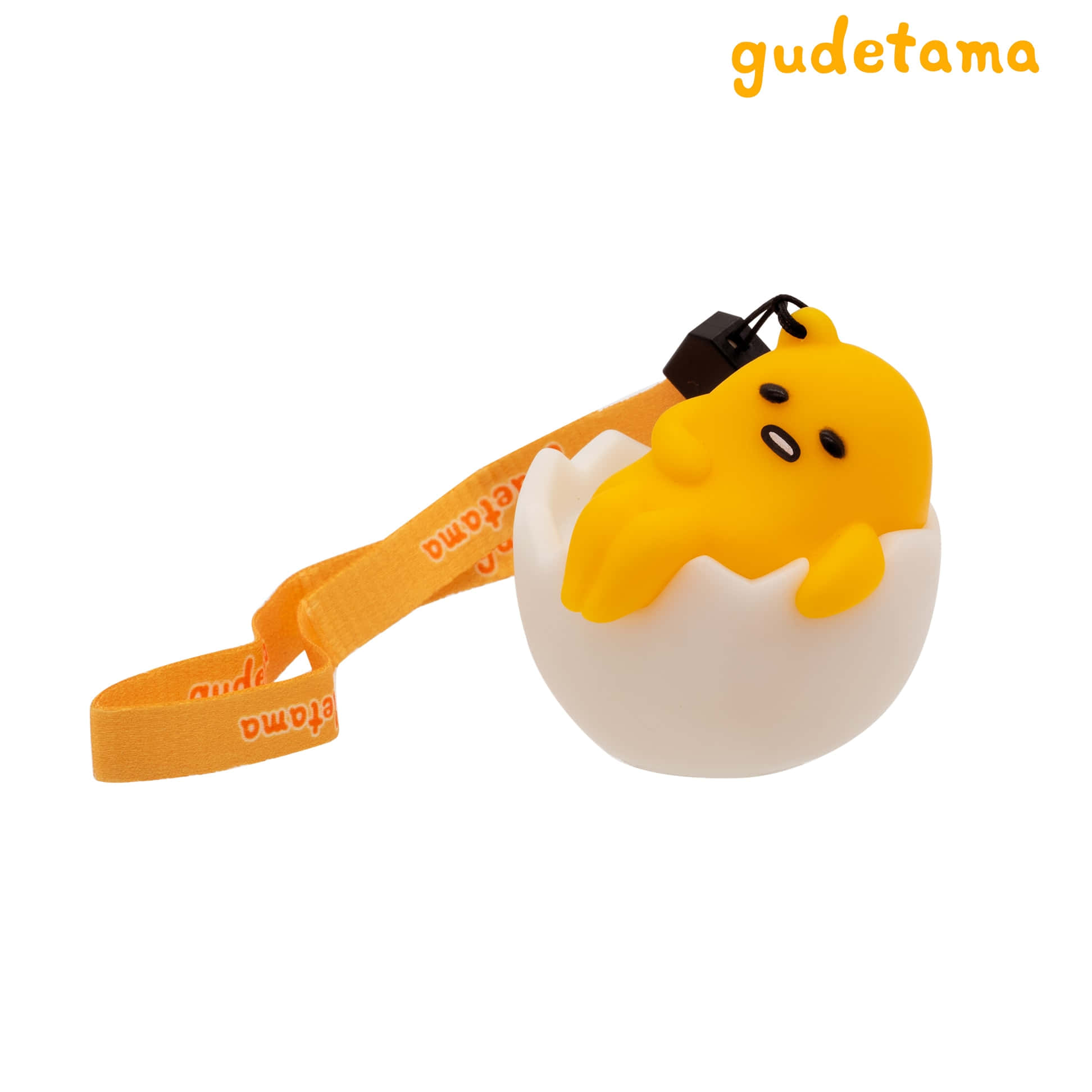 Gudetama絨毛鑰匙圈在蛋殼中懶散地躺著，配有橙色帶子。 — 蛋黃哥 壁紙