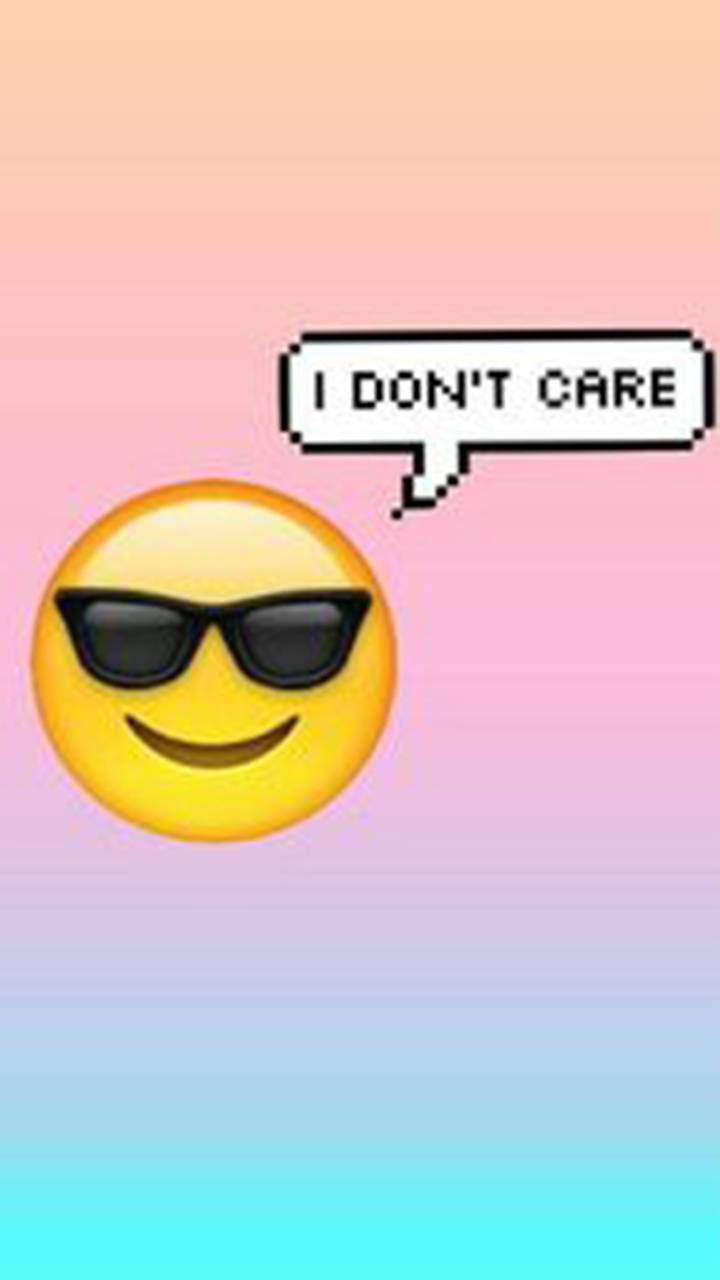 I Dont Care 桌布 壁紙 — 一個黃色表情符號戴著黑色太陽眼鏡，在粉彩漸變背景上有一個對話框寫著「我不在乎」。