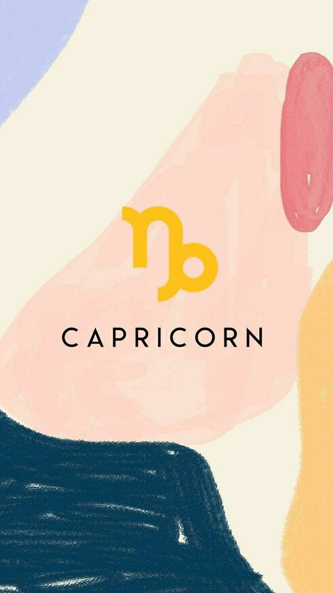 Capricorn 桌布 壁紙 — 一個黃色風格化的摩羯座星座符號，在柔和粉彩抽象形狀和紋理筆觸的襯托下脫穎而出。