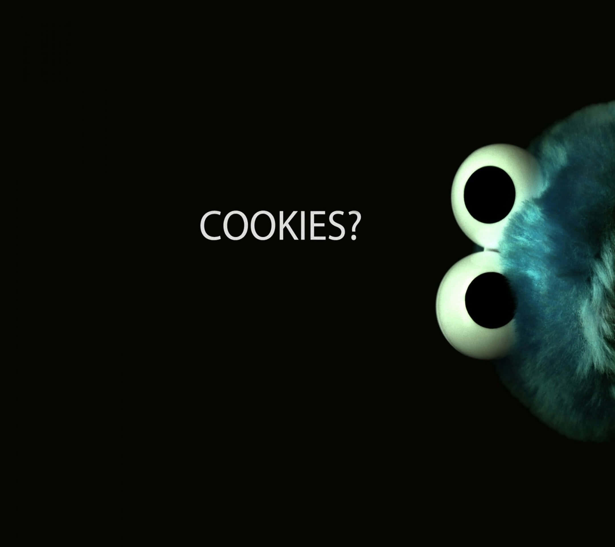 Sesame Street 桌布 壁紙 — 一個黑暗場景，右邊有Cookie Monster好奇的眼睛窺視，並有白色文字寫著cookies?。