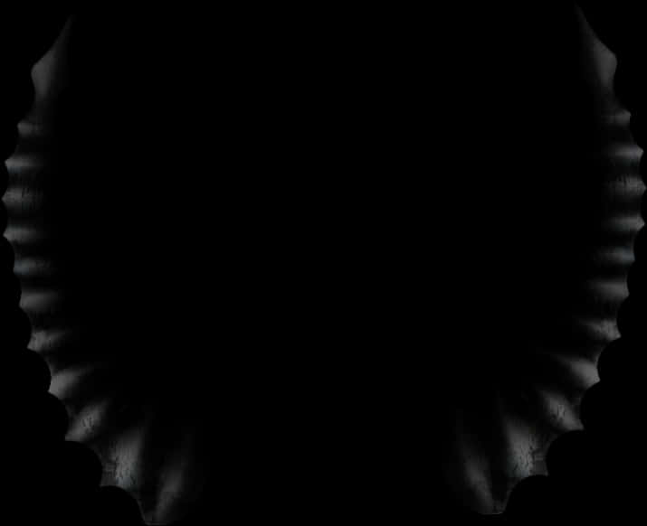 Devil Horn 桌布 壁紙 — 一個黑暗抽象圖案，帶有放射狀光線漸變，在黑色背景上形成扇貝形邊框。