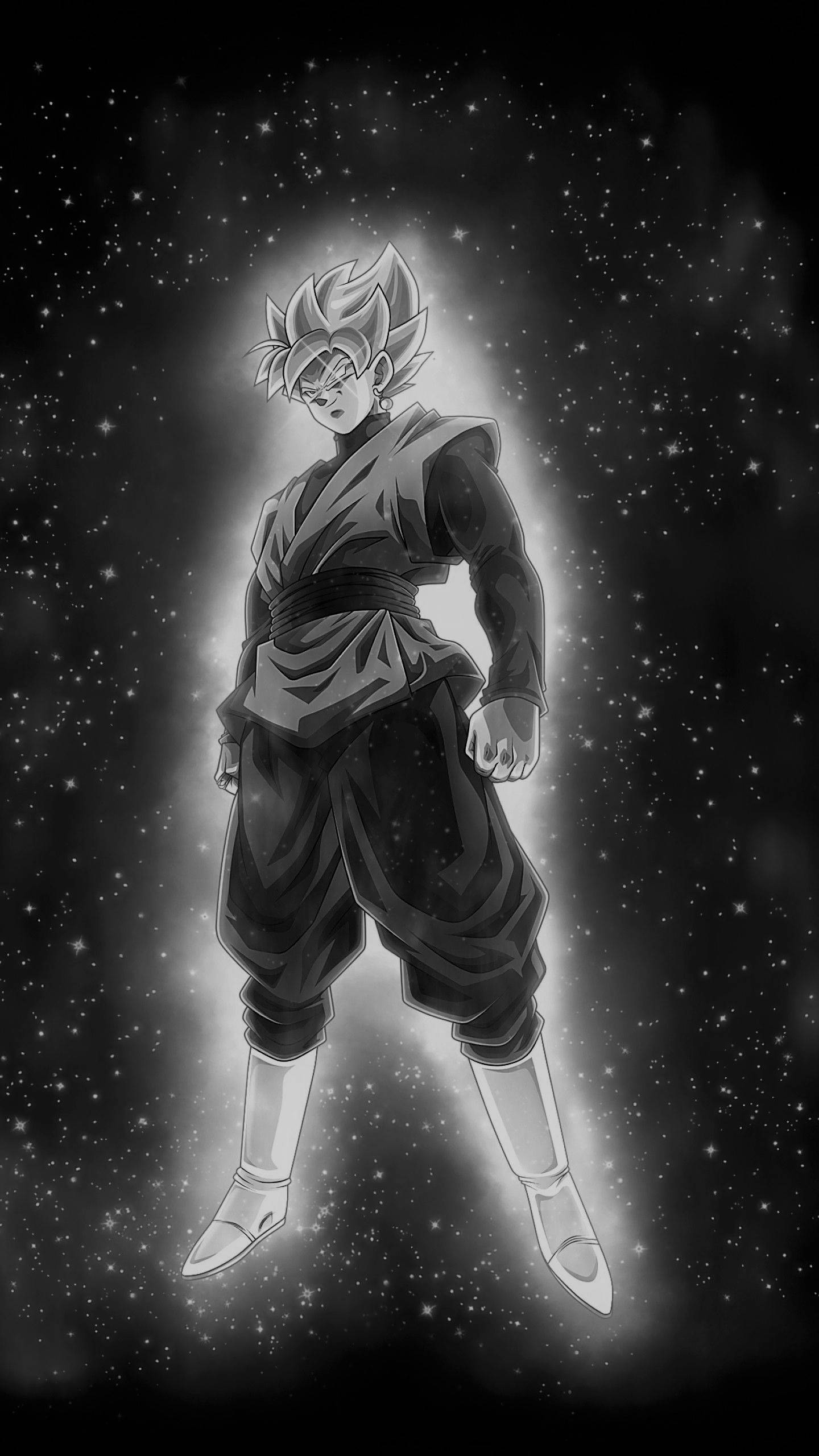 悟空 桌布 壁紙 — 一個黑白動漫戰士，頭髮尖刺，漂浮在星空虛空中，身體散發出發光的光環。