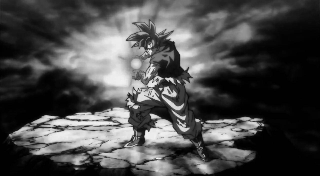 Goku Black And White 桌布 壁紙 — 一個黑白動漫戰士站在裂開的地面上，在暴風雨的天空下引導能量。
