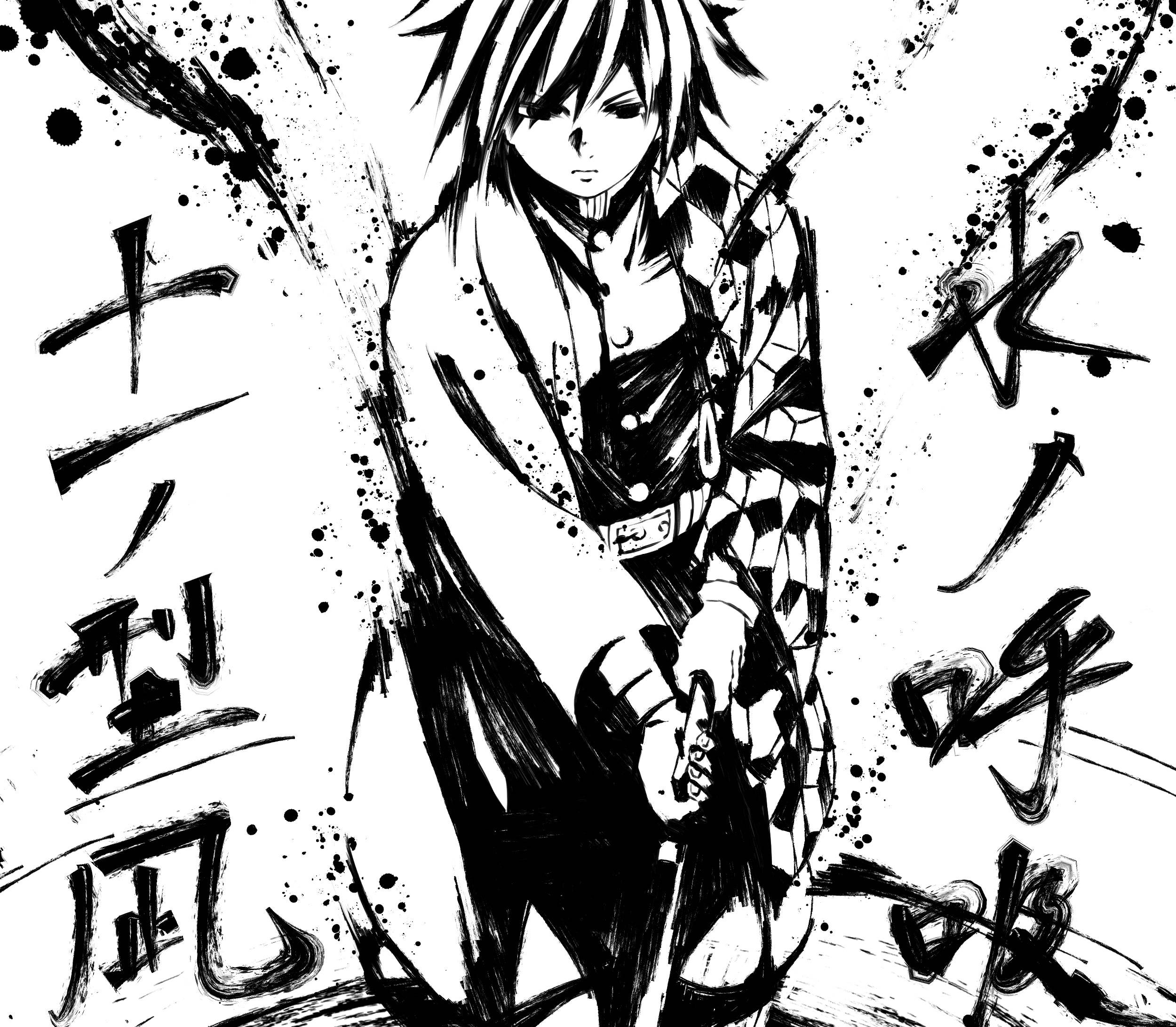 Demon Slayer Black And White 桌布 壁紙 — 一個黑白動漫角色，擁有尖刺頭髮和格紋和服，以動態姿勢站立，周圍環繞著墨跡和日本書法。