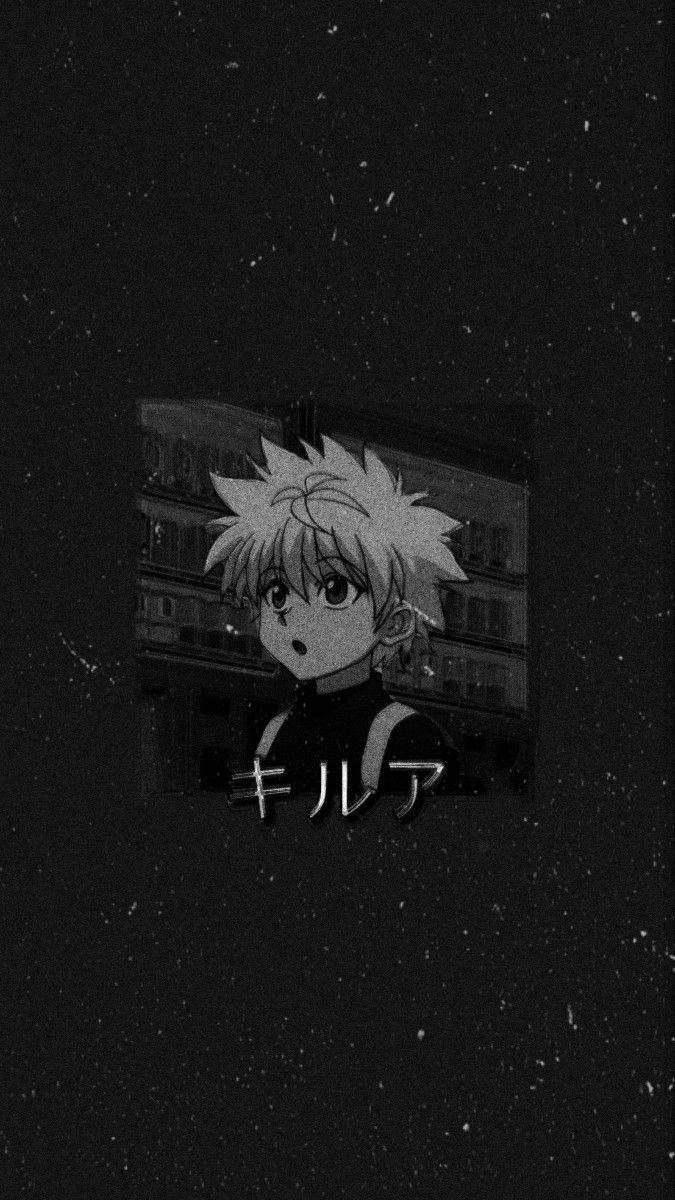 奇犽 桌布 壁紙 — 一個黑白動漫角色，頭髮尖刺，在星空夜晚的窗戶前凝視外面。