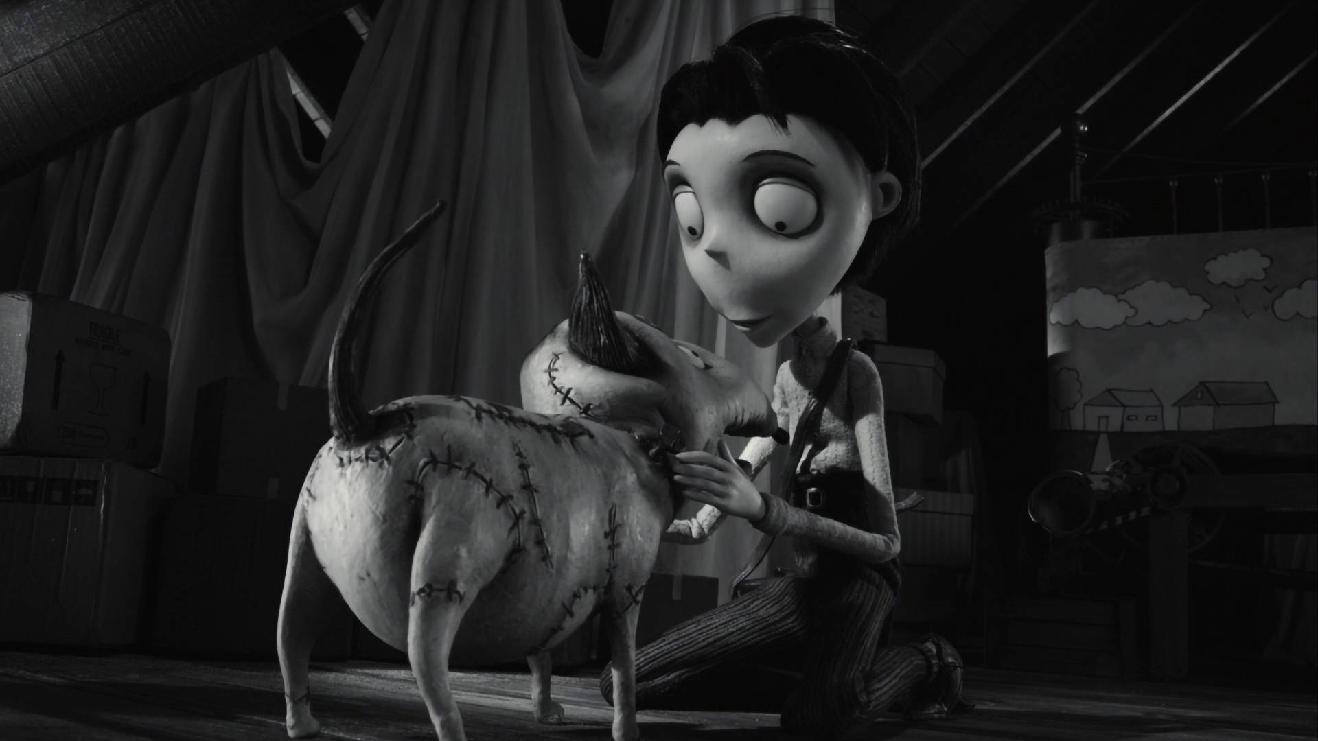 Frankenweenie 桌布 壁紙 — 一個黑白動畫場景，一隻縫合狗和一個縫合小孩在雜亂的閣樓裡一起跪下。