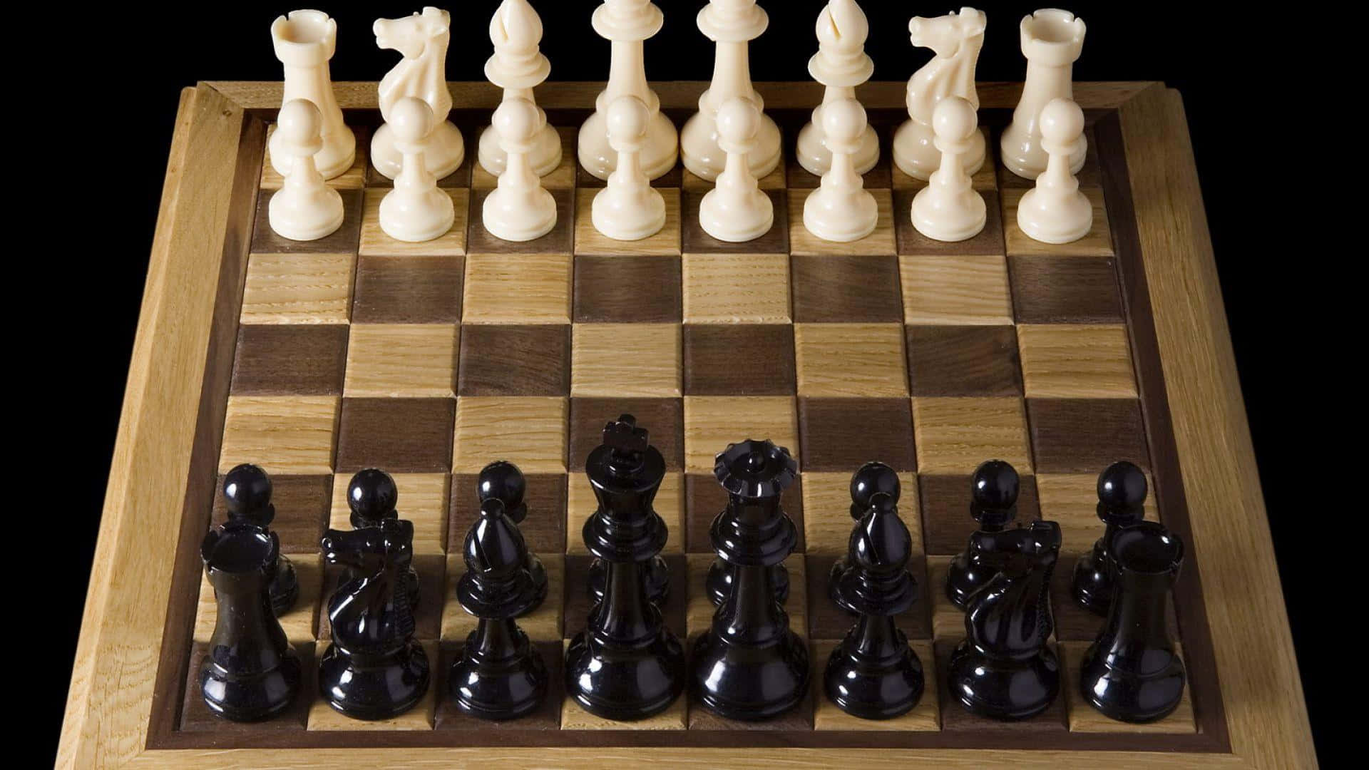 一個黑白棋子的西洋棋盤 壁紙