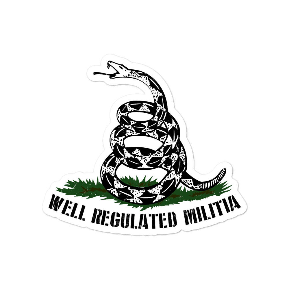 Flag 桌布 壁紙 — 一個黑白貼紙，上面有一條盤繞的響尾蛇在綠色草地上，並帶有文字 well regulated militia。