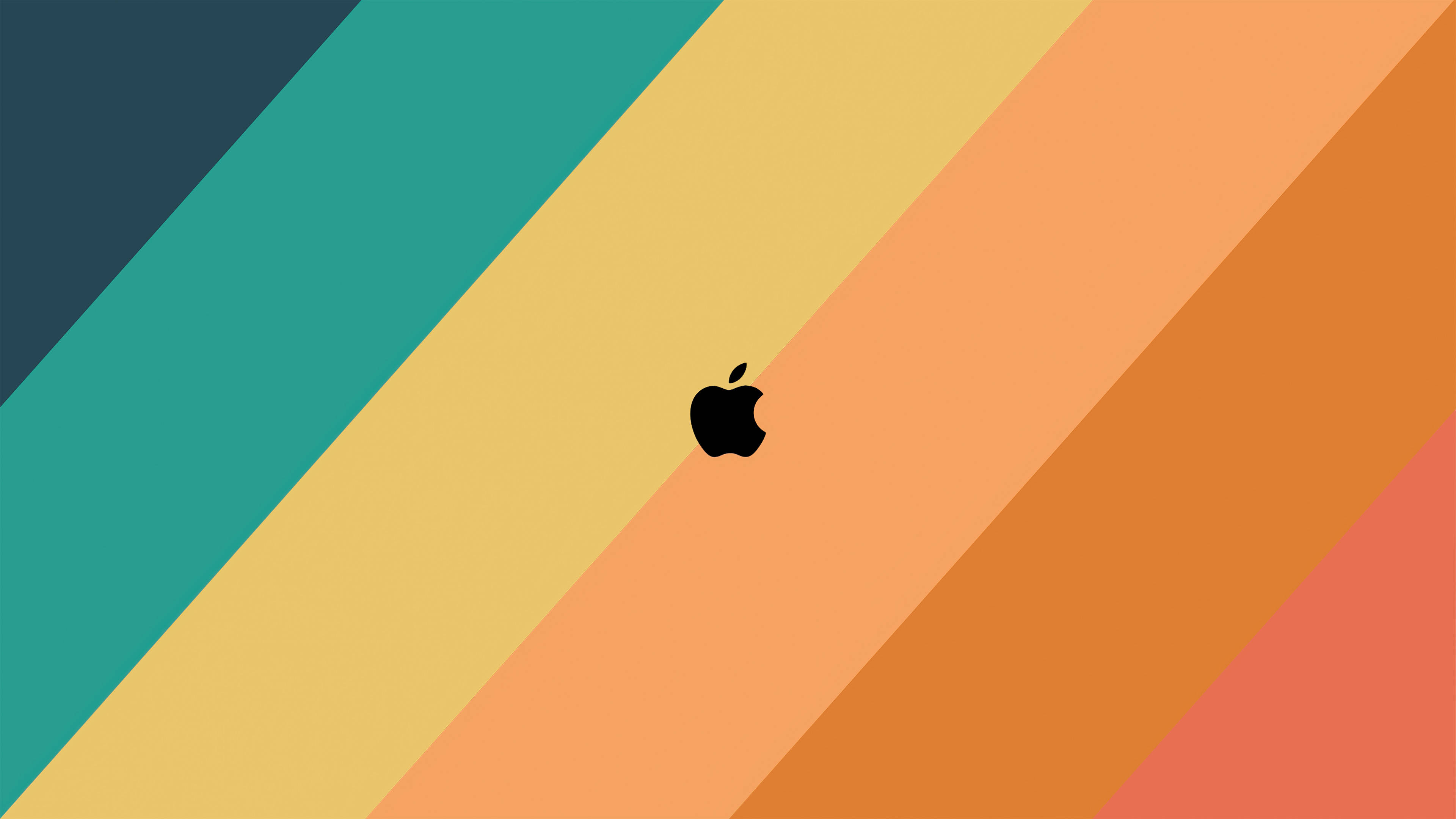 Mac 桌布 壁紙 — 一個黑色Apple標誌居中於充滿活力的對角漸變色（青綠色、黃色、橙色和珊瑚色）上。