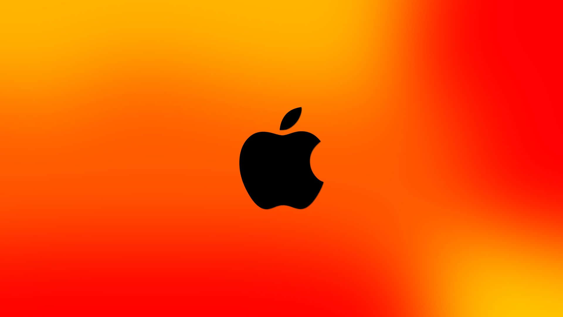 Gradient 桌布 壁紙 — 一個黑色Apple標誌居中於從黃色過渡到深紅色的鮮豔漸變背景上。