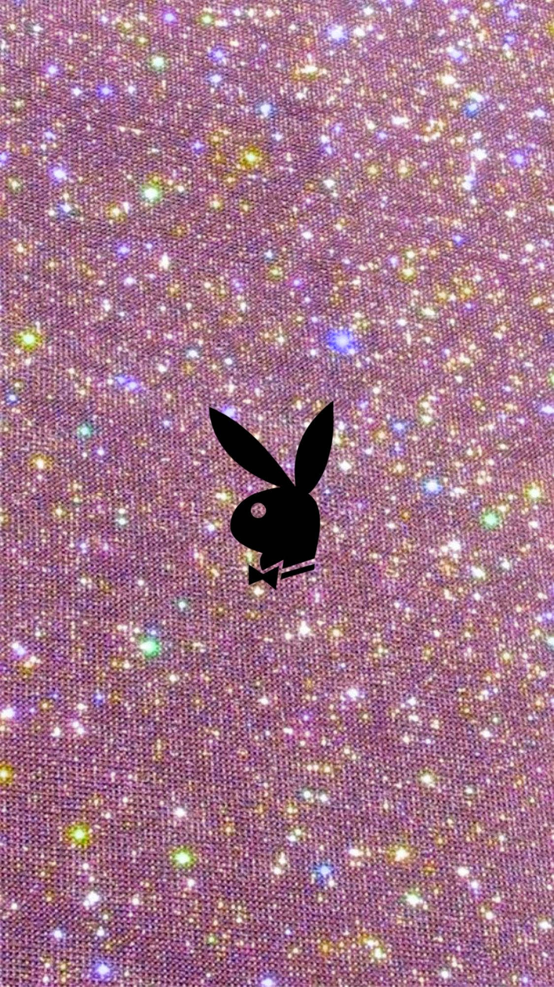 花花公子 桌布 壁紙 — 一個黑色Playboy兔子標誌置中於閃爍的粉紅色背景上，帶有彩虹閃粉。