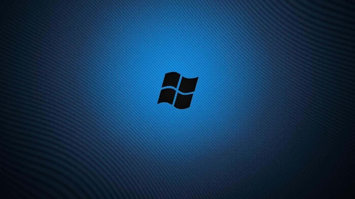 Windows Logo 桌布 壁紙 — 一個黑色Windows標誌置中於帶有微妙放射紋理的藍色漸變背景上。